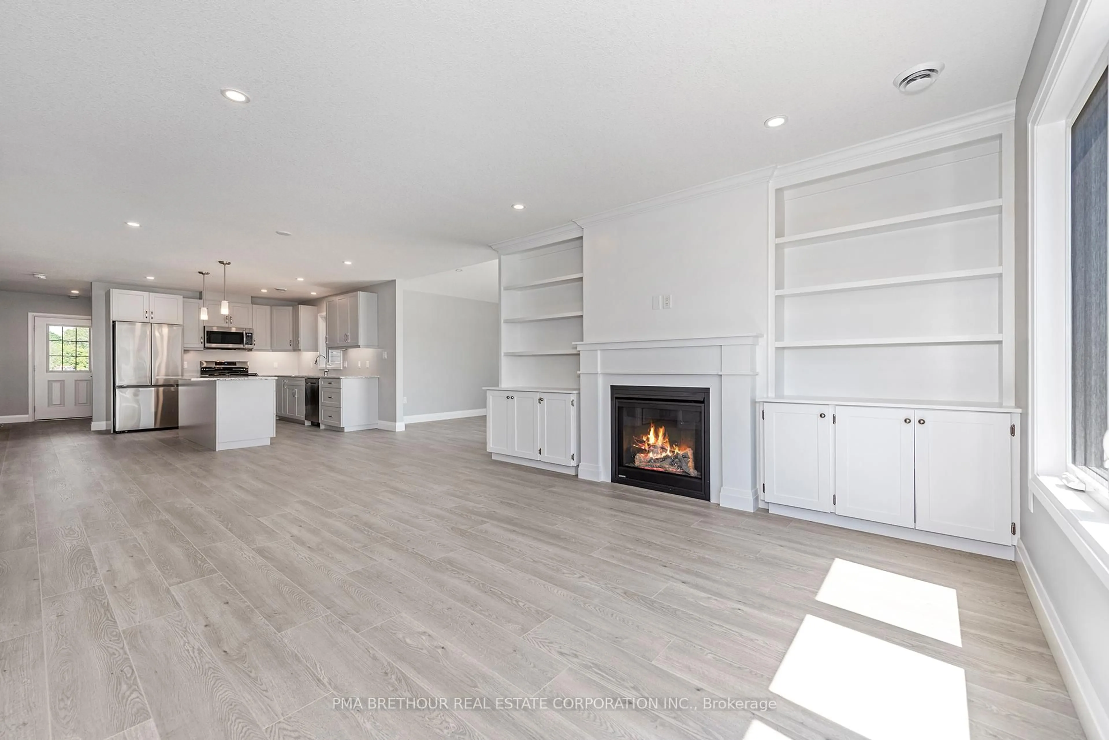Open concept kitchen, wood/laminate floor for 8 Sweet Water Dr, Ashfield-Colborne-Wawanosh Ontario N7A 0C6