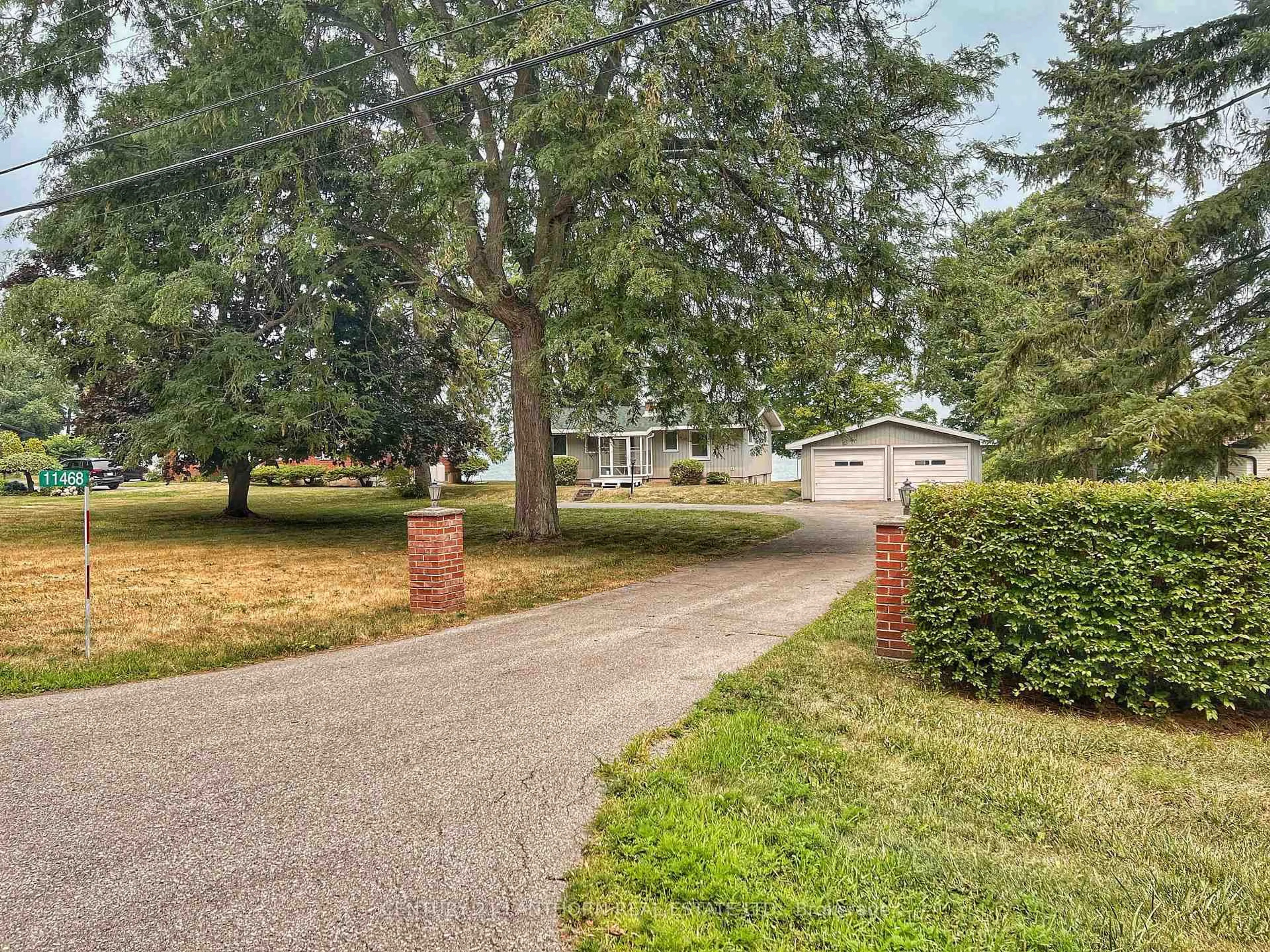 A pic from outside/outdoor area/front of a property/back of a property/a pic from drone, street for 11468 Loyalist Pkwy, Prince Edward County Ontario K0K 2T0
