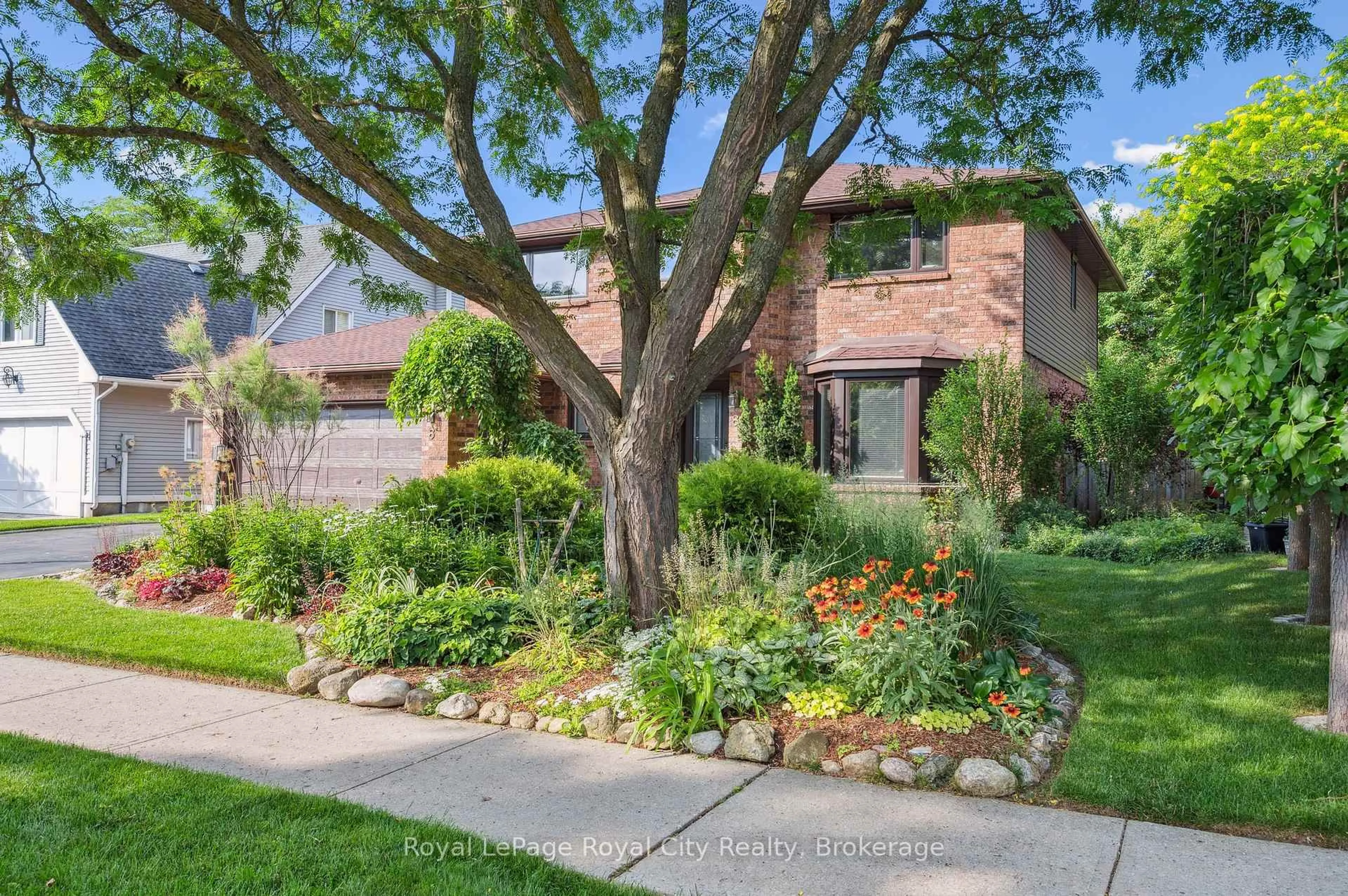 Home with brick exterior material, street for 8 Forster Dr, Guelph Ontario N1G 4N2
