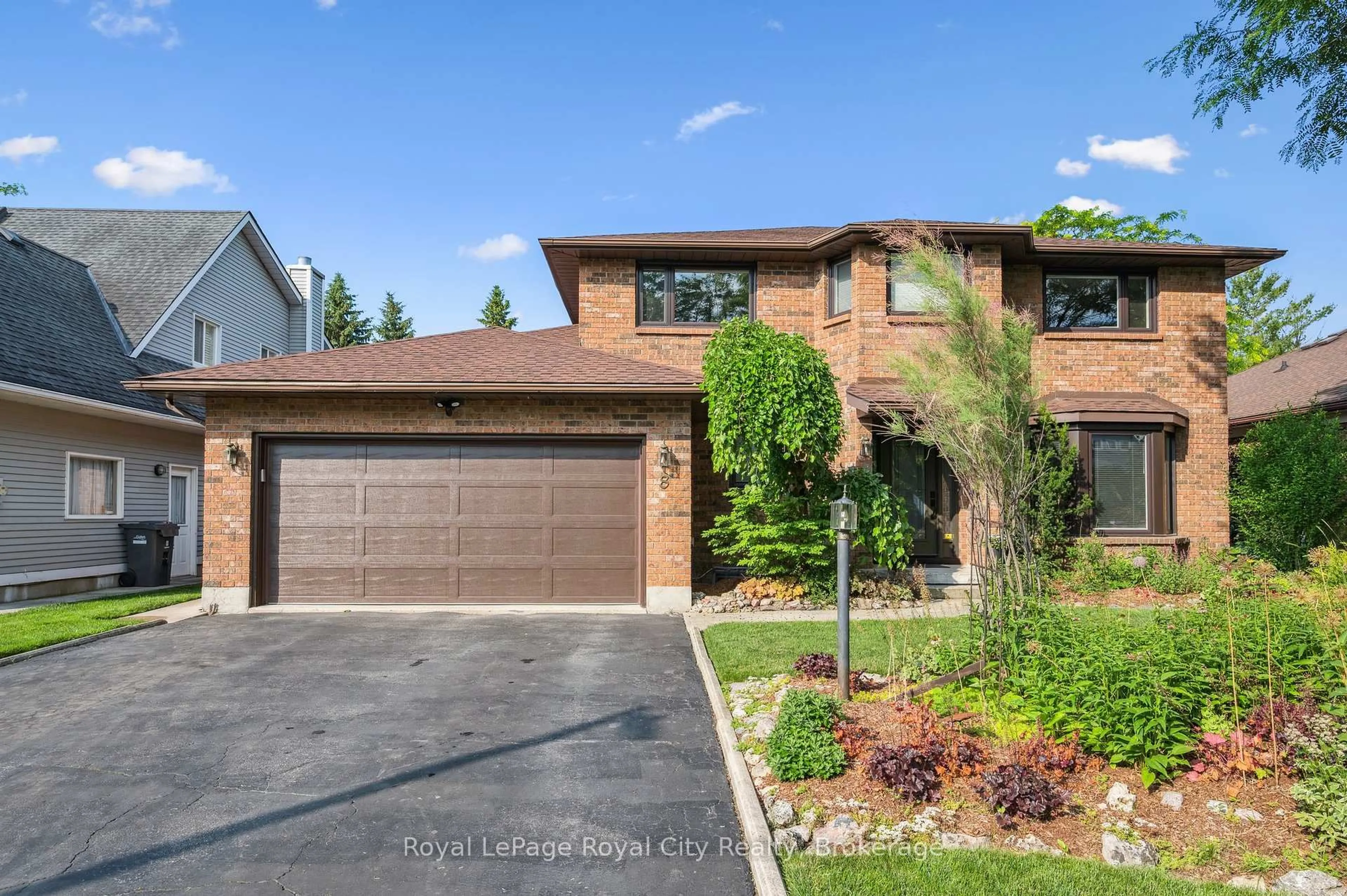 Home with brick exterior material, street for 8 Forster Dr, Guelph Ontario N1G 4N2
