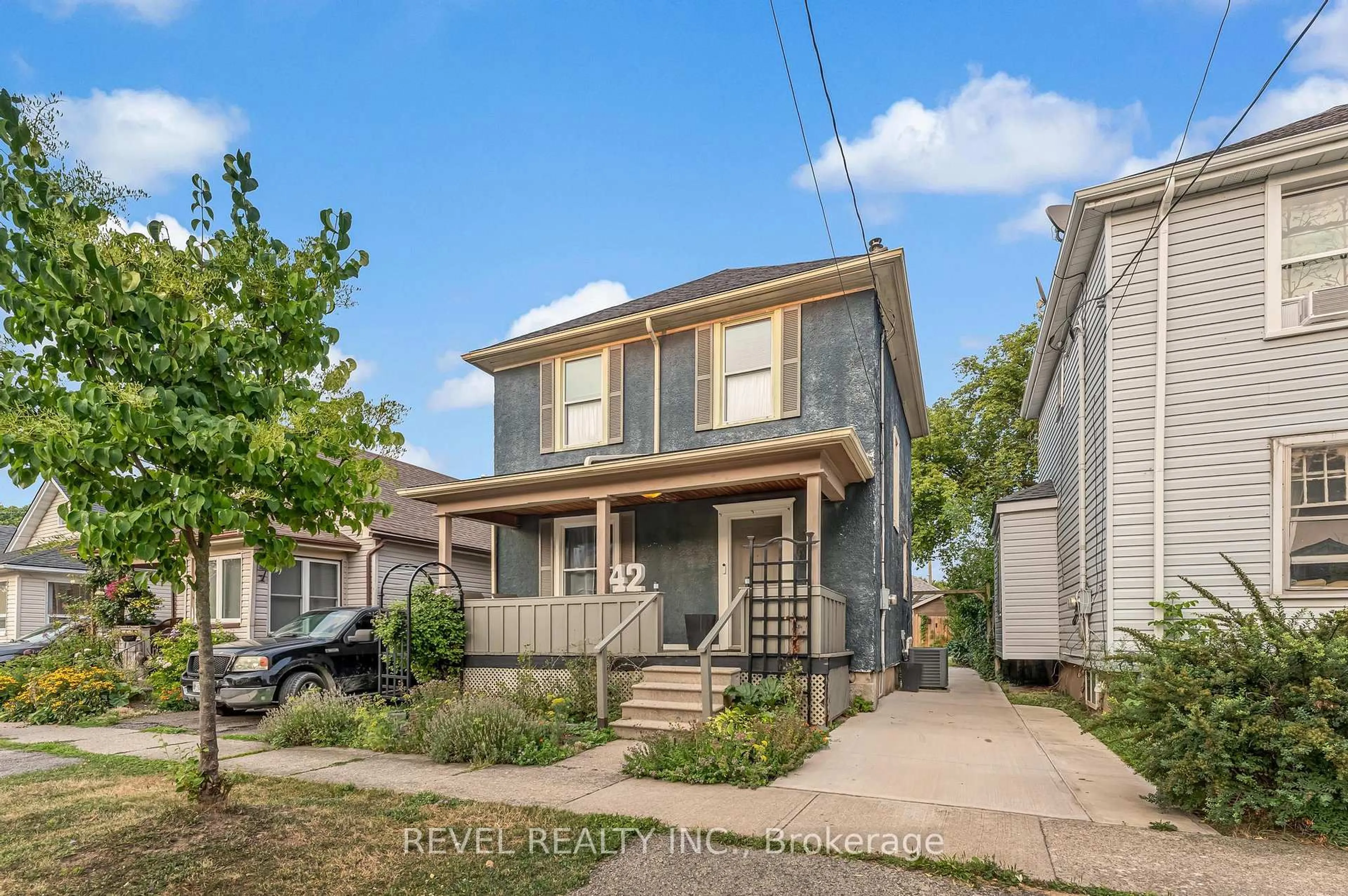 Home with brick exterior material, street for 42 Berryman Ave, St. Catharines Ontario L2R 3W9