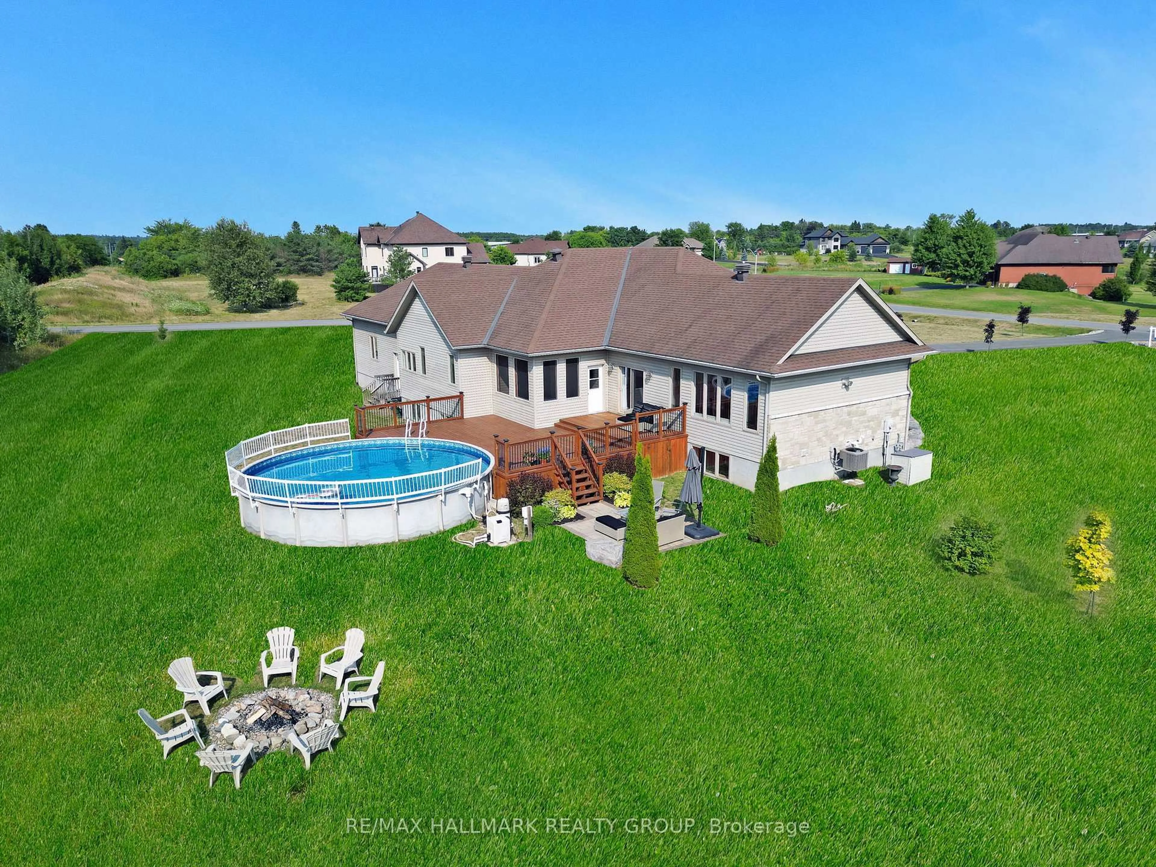 A pic from outside/outdoor area/front of a property/back of a property/a pic from drone, water/lake/river/ocean view for 210 West Lake Circ, Carp Ontario K0A 1L0