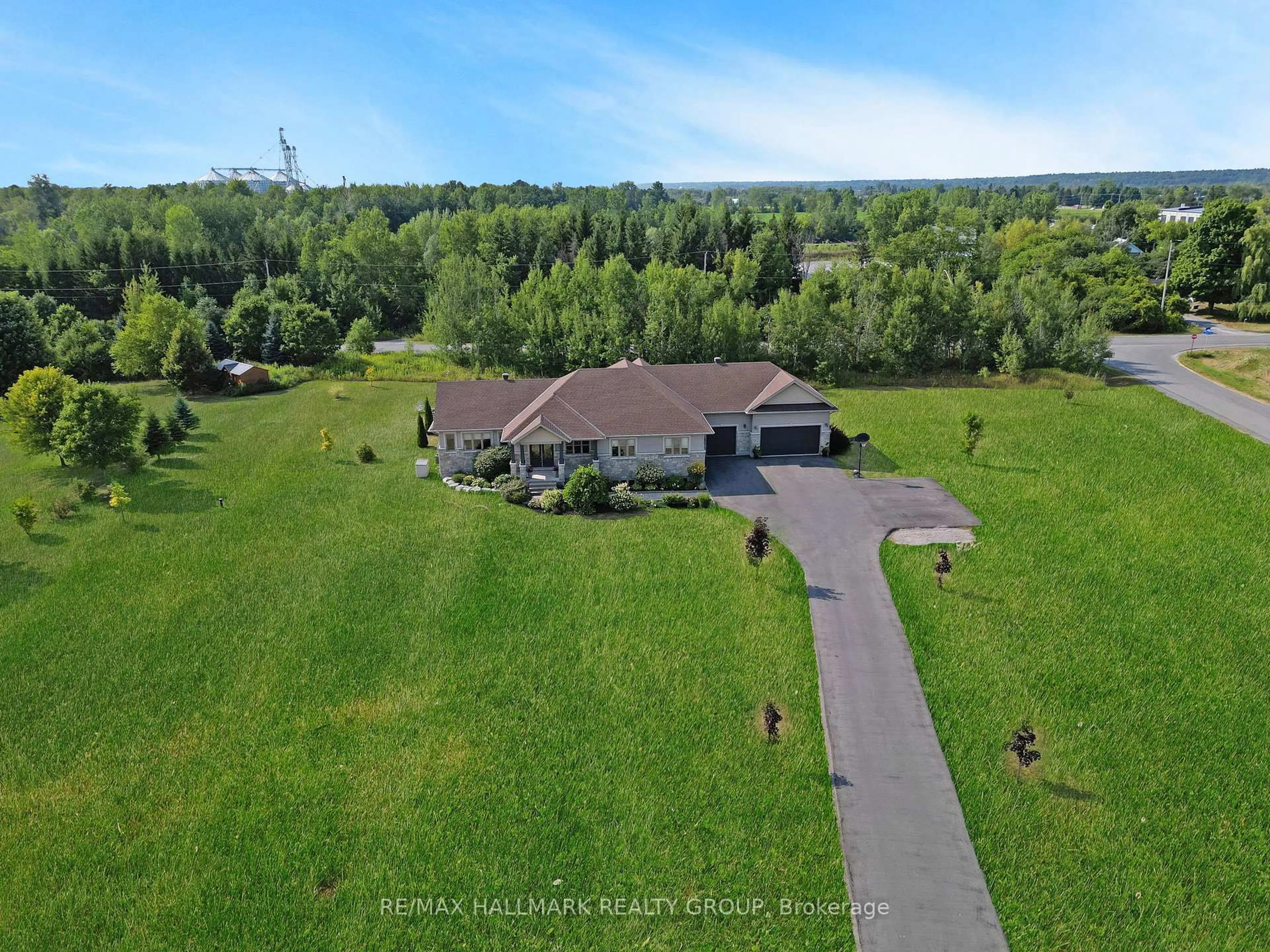 A pic from outside/outdoor area/front of a property/back of a property/a pic from drone, water/lake/river/ocean view for 210 West Lake Circ, Carp Ontario K0A 1L0