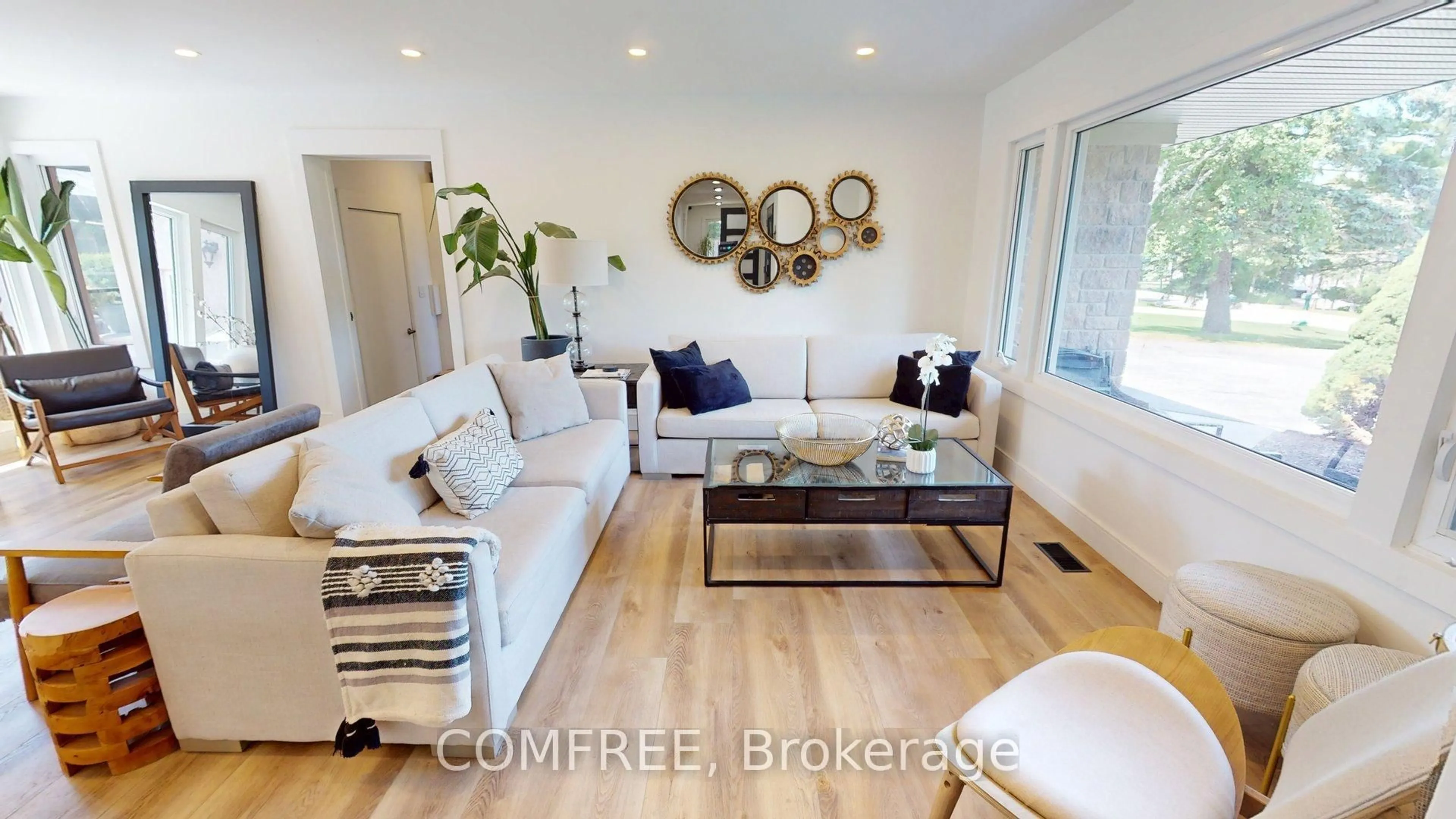 Living room with furniture, wood/laminate floor for 477 Fairview St, Wilmot Ontario N3A 1M6