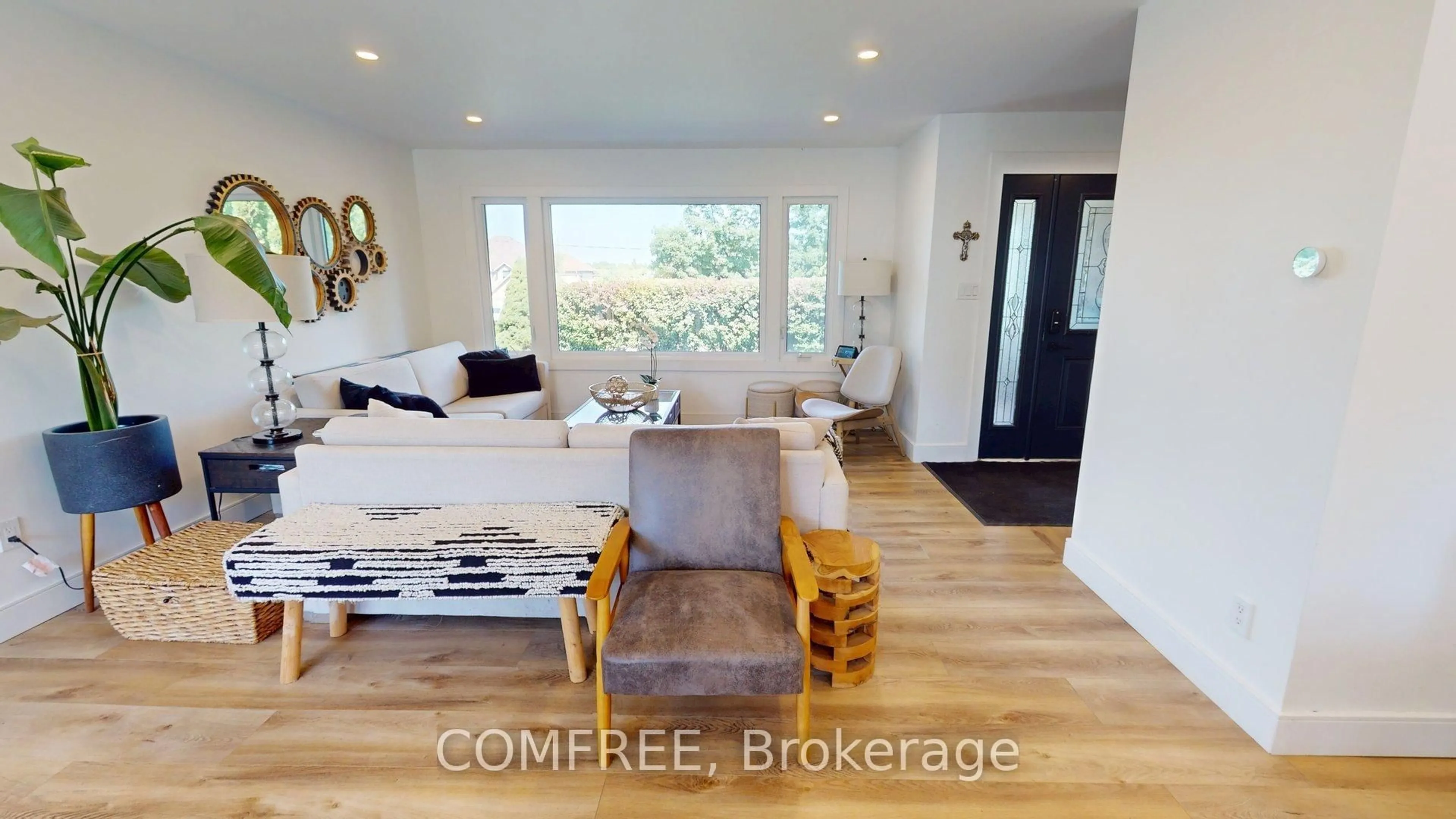 Living room with furniture, wood/laminate floor for 477 Fairview St, Wilmot Ontario N3A 1M6