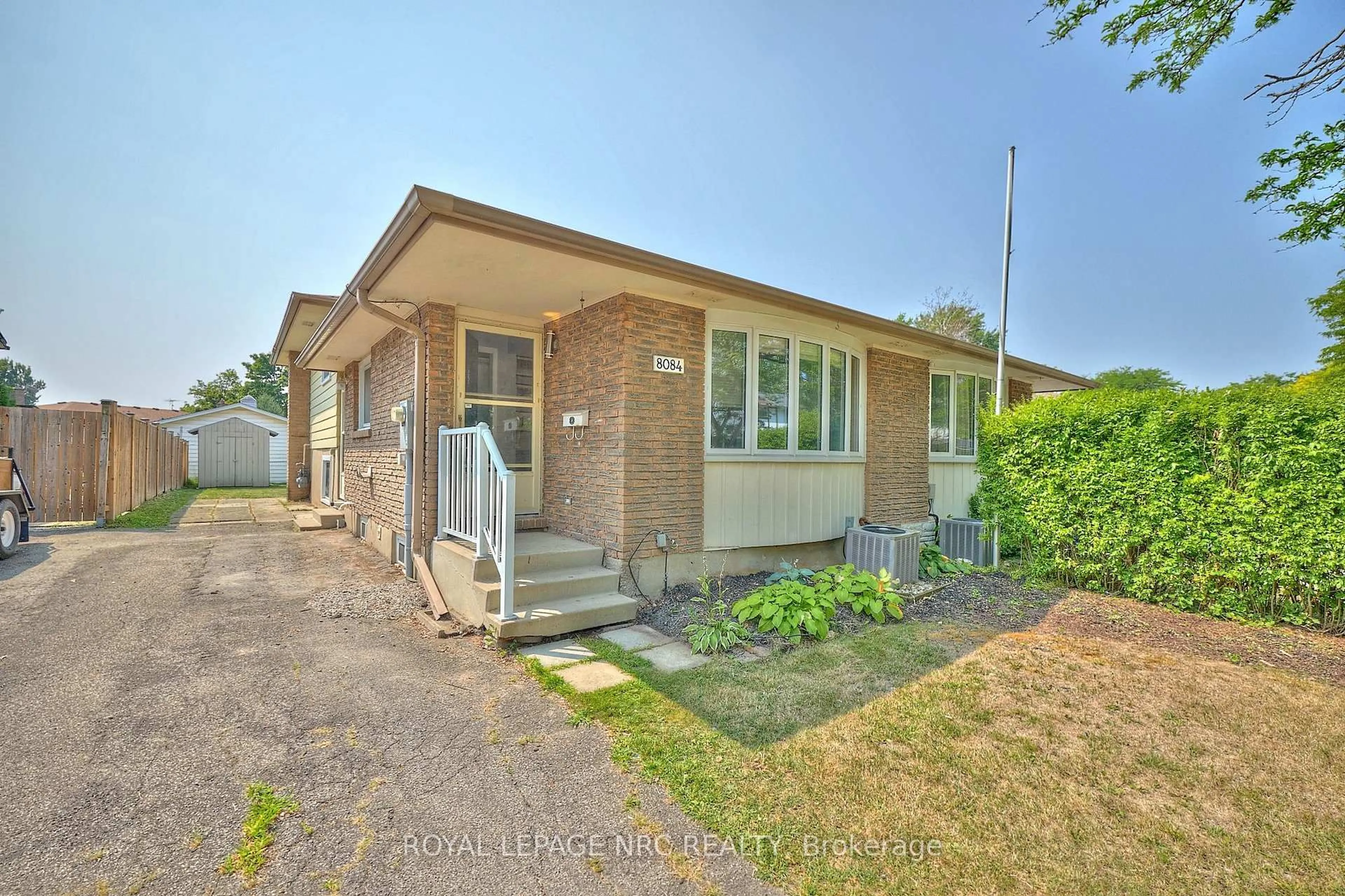 Home with brick exterior material, street for 8084 Aintree Dr, Niagara Falls Ontario L2H 1V7