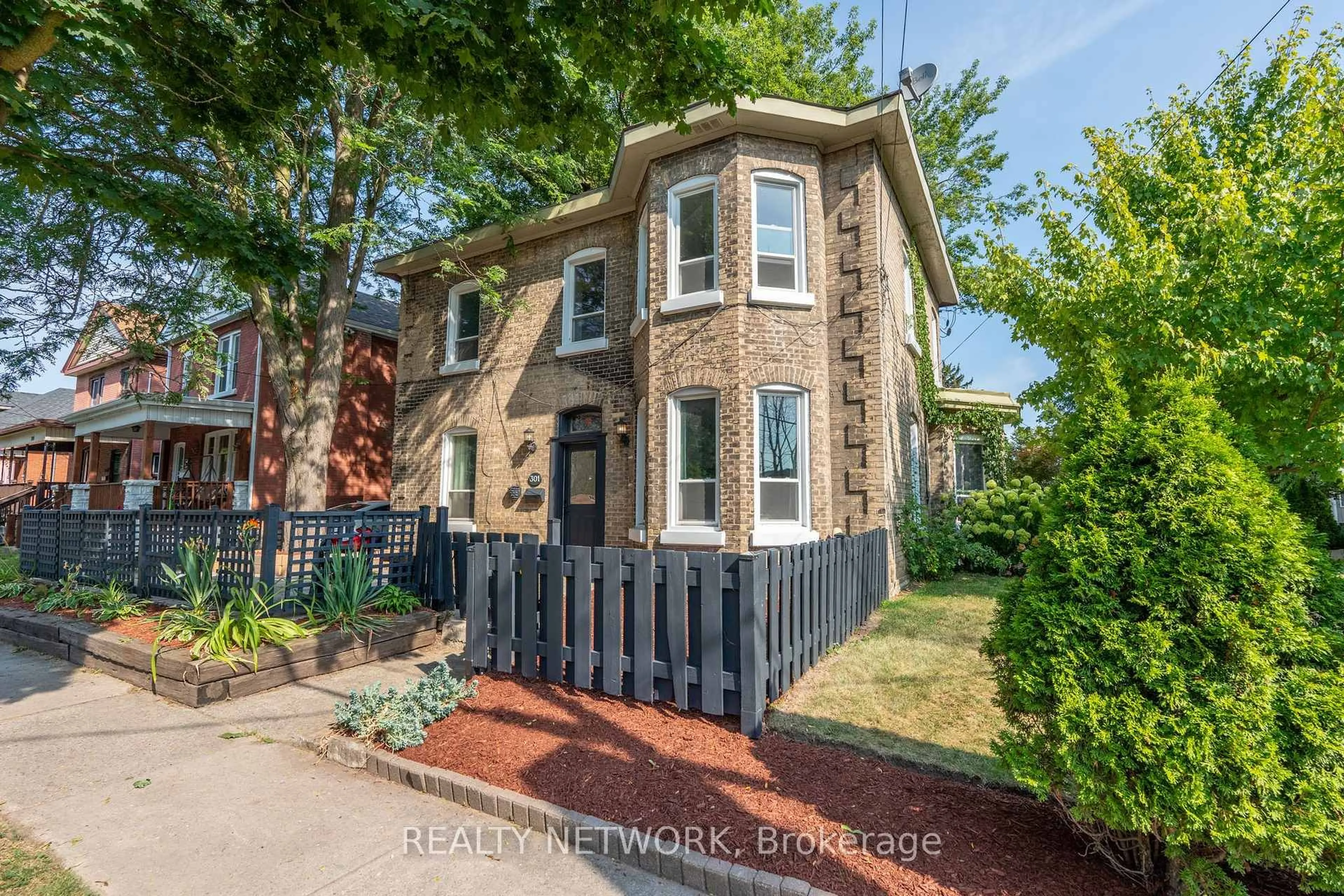 Home with brick exterior material, street for 301 Grand River Ave, Brantford Ontario N3T 4Y6
