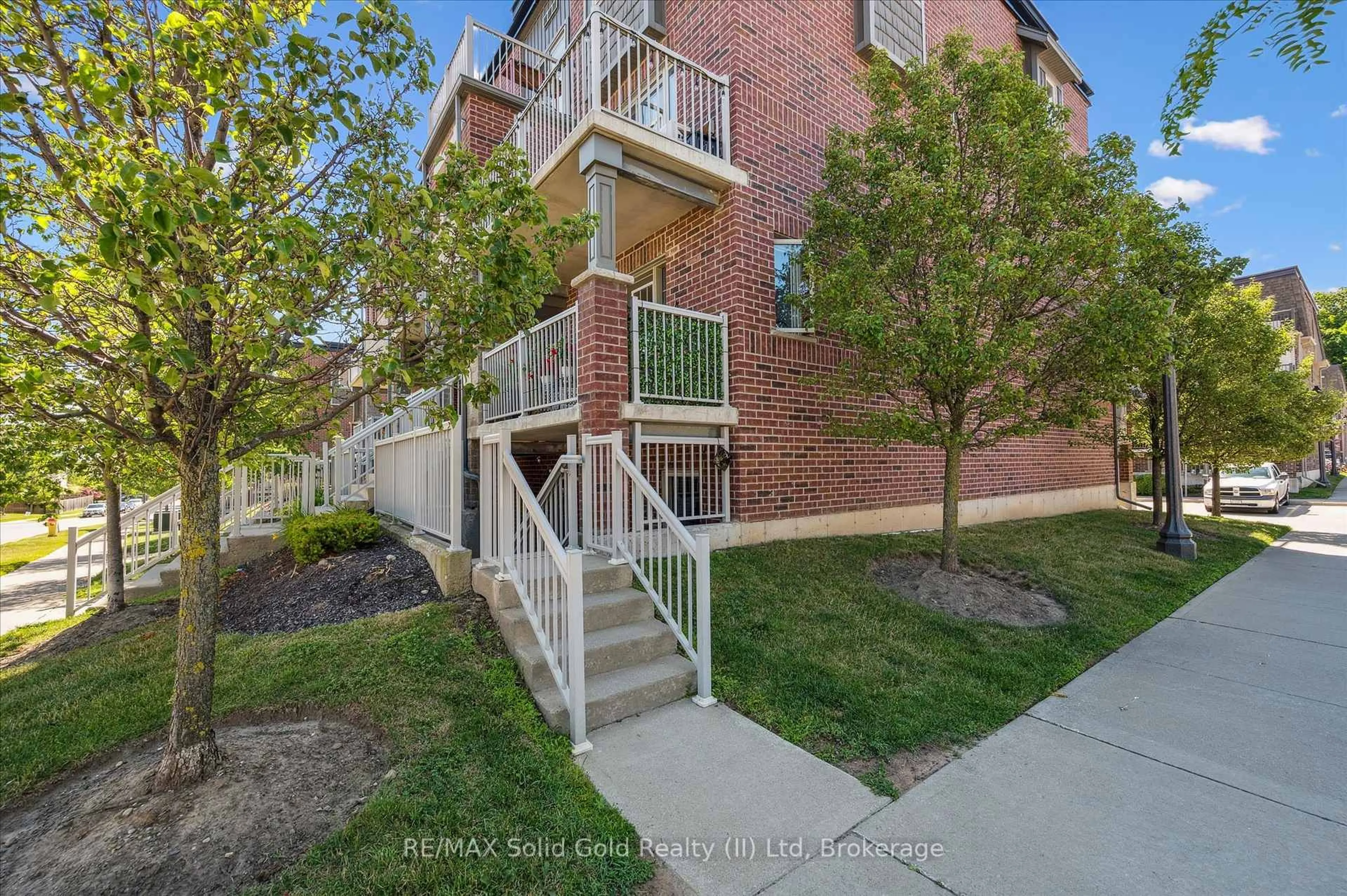 A pic from outside/outdoor area/front of a property/back of a property/a pic from drone, street for 20 Sienna St #D, Kitchener Ontario N2R 0H6