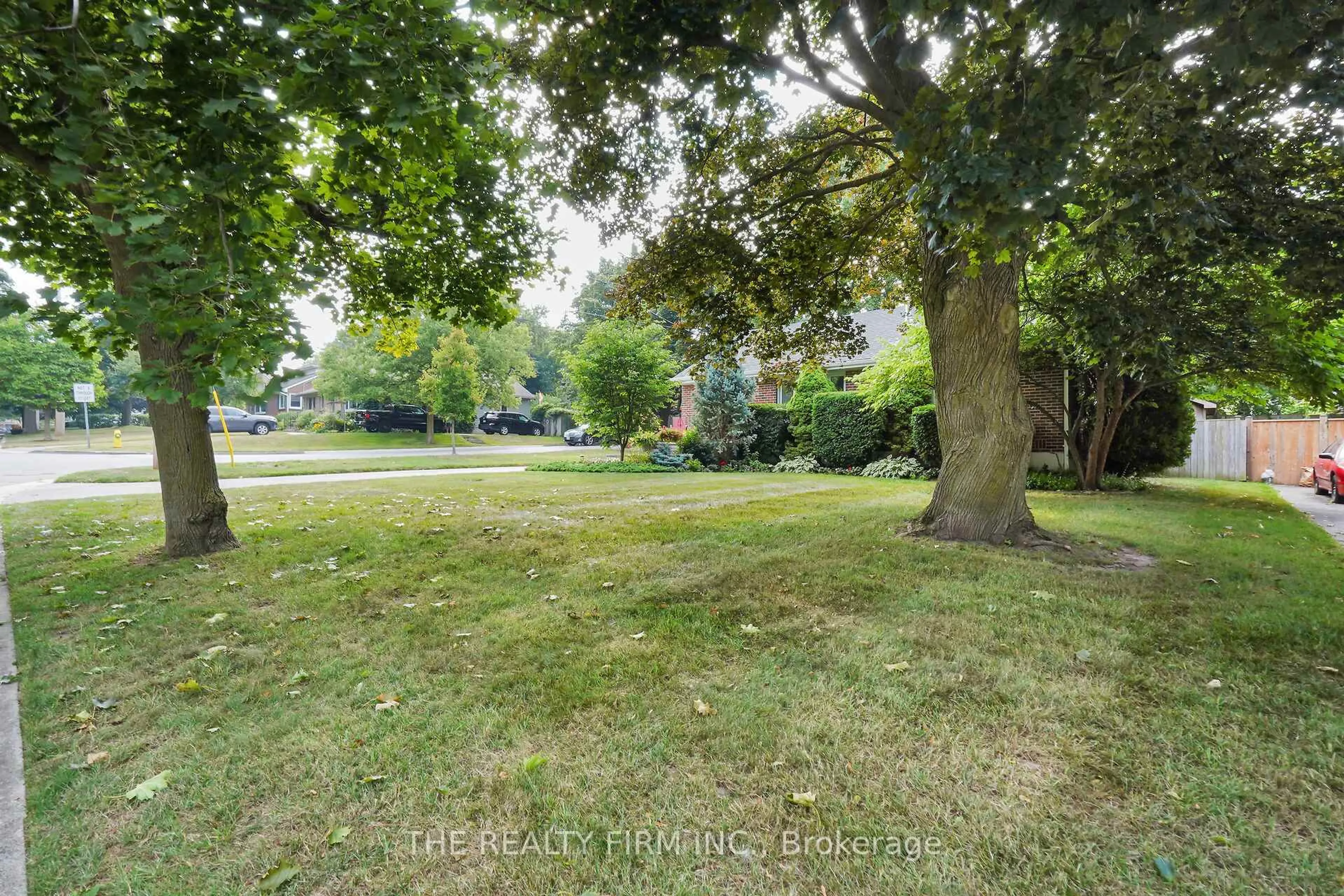 A pic from outside/outdoor area/front of a property/back of a property/a pic from drone, forest/trees view for 715 Leroy Ave, London East Ontario N5Y 4G4