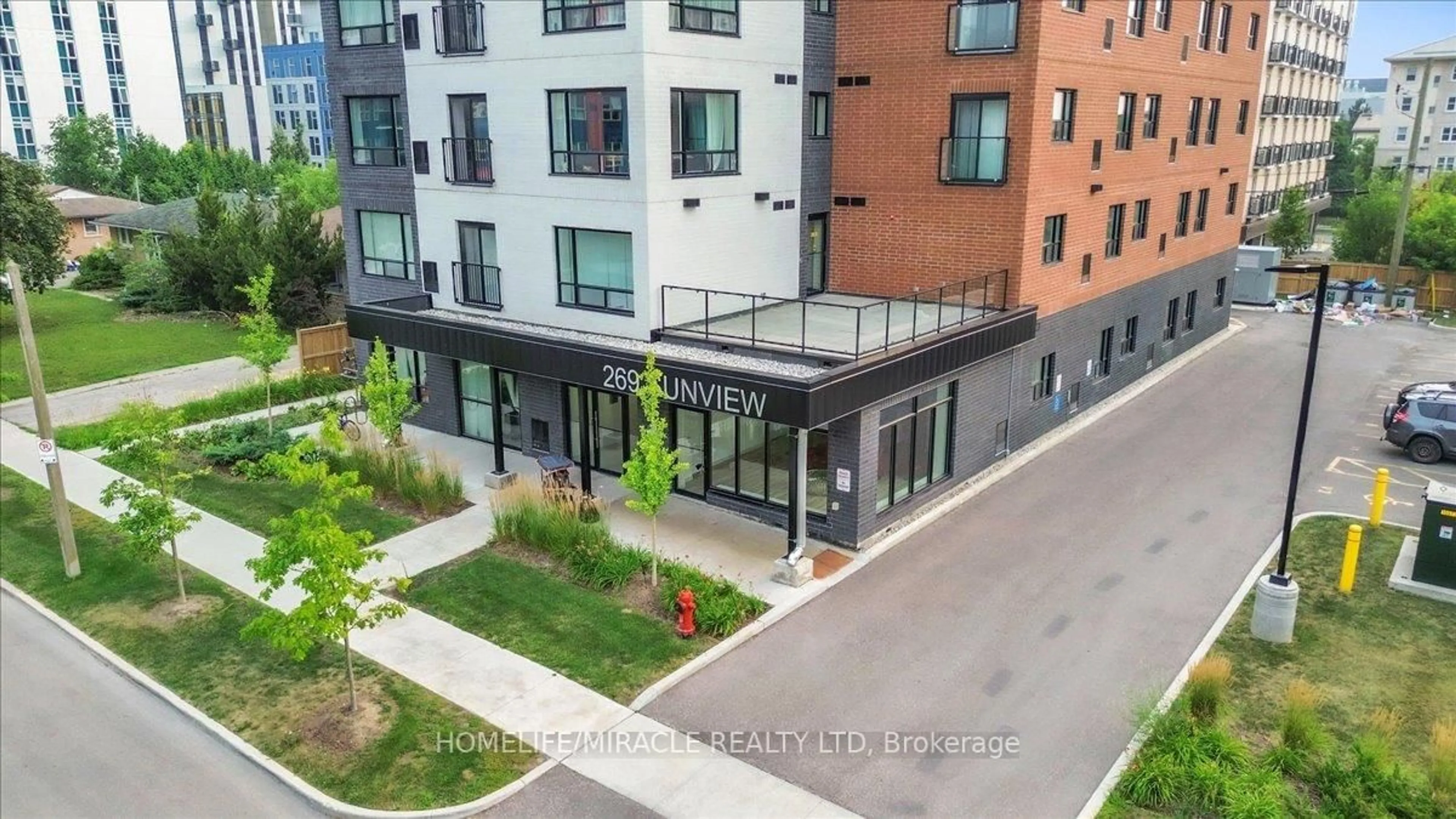A pic from outside/outdoor area/front of a property/back of a property/a pic from drone, unknown for 269 Sunview St #205, Waterloo Ontario N2L 3V8