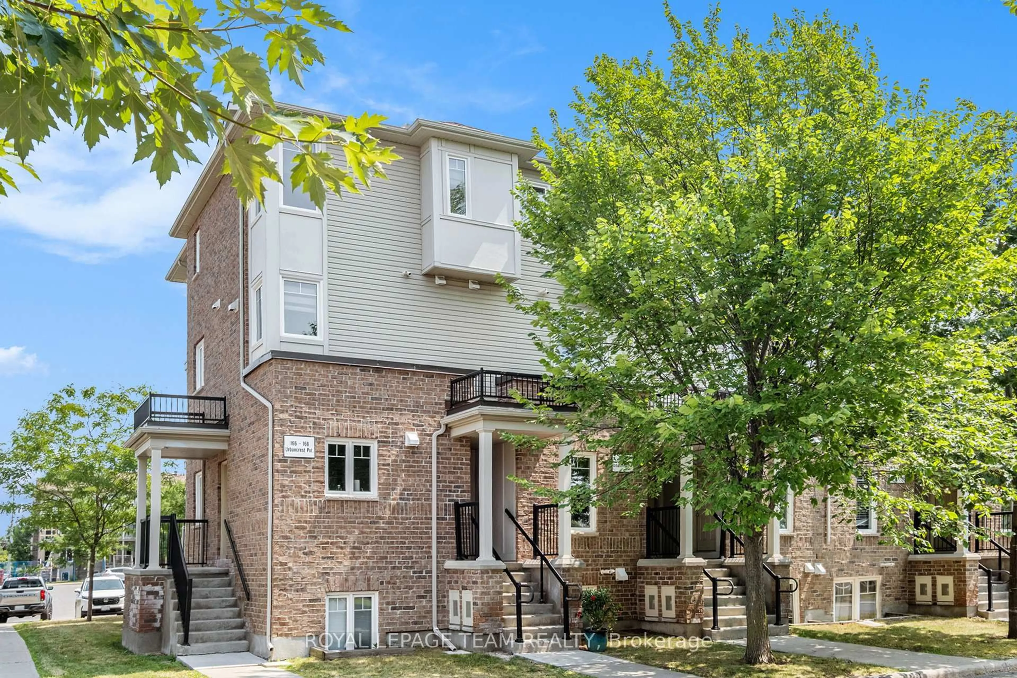 Home with brick exterior material, street for 168 Urbancrest Private #58, Ottawa Ontario K2J 2S7