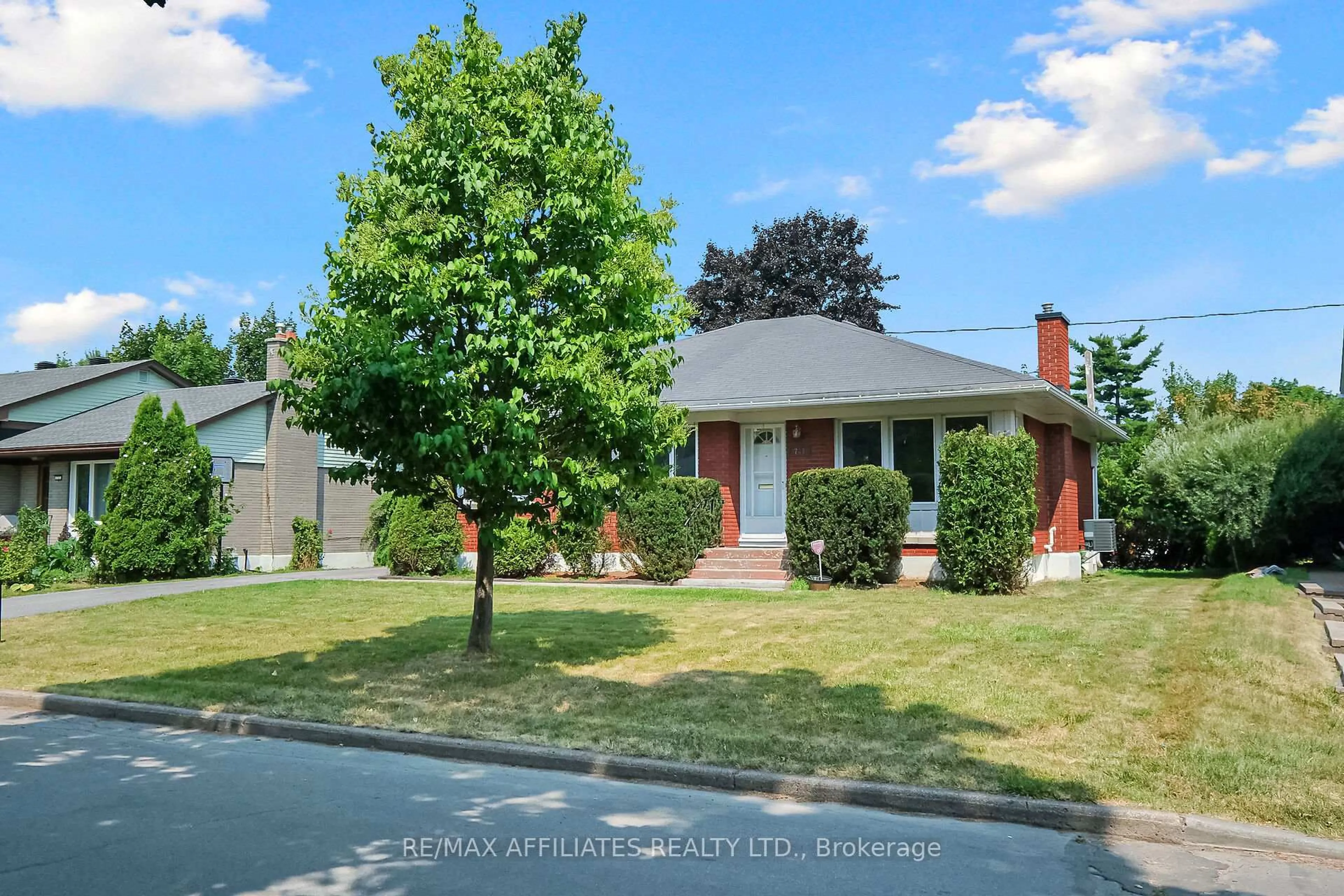 Home with brick exterior material, street for 743 Fairdale Ave, Ottawa Ontario K1G 1X6