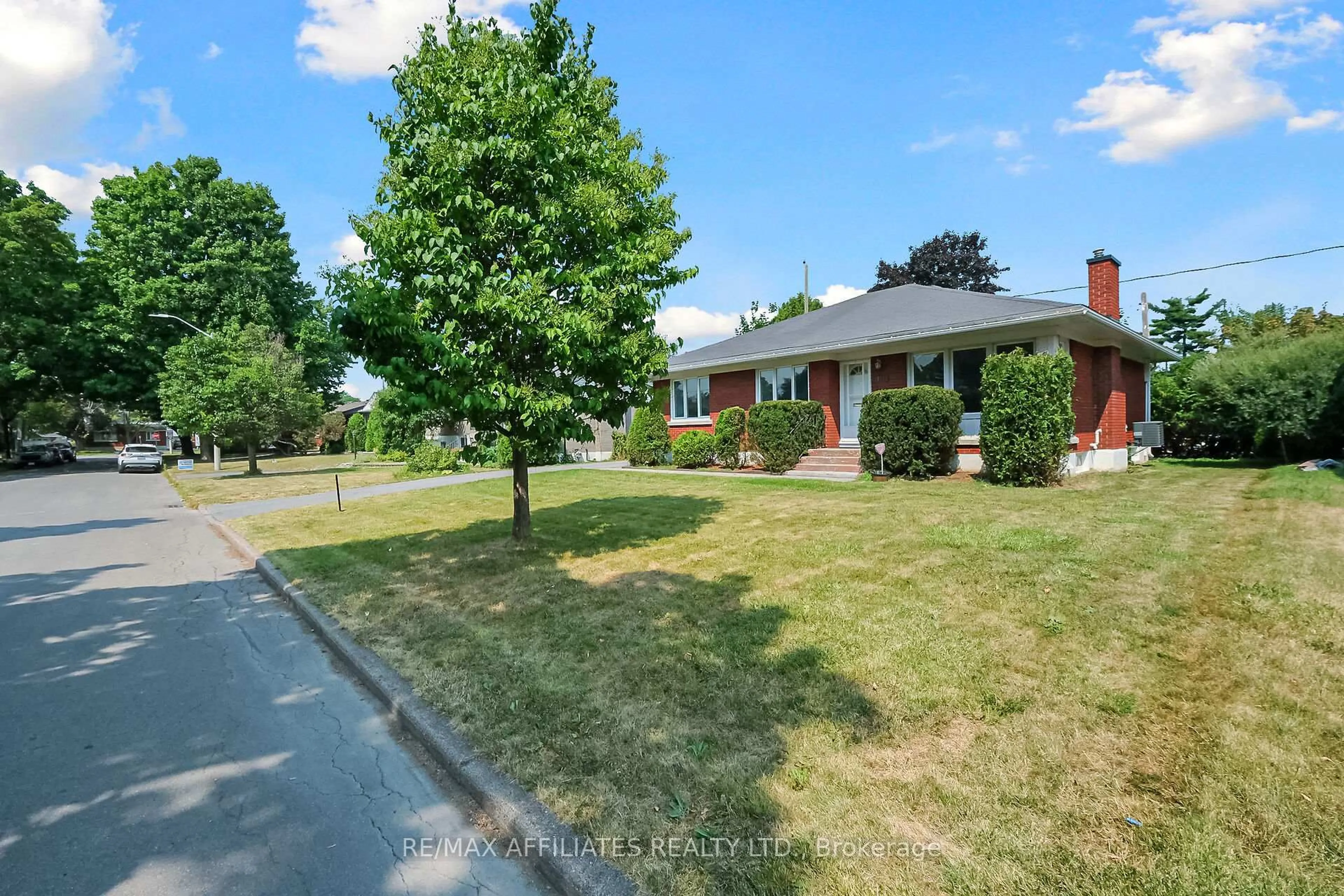 A pic from outside/outdoor area/front of a property/back of a property/a pic from drone, street for 743 Fairdale Ave, Ottawa Ontario K1G 1X6