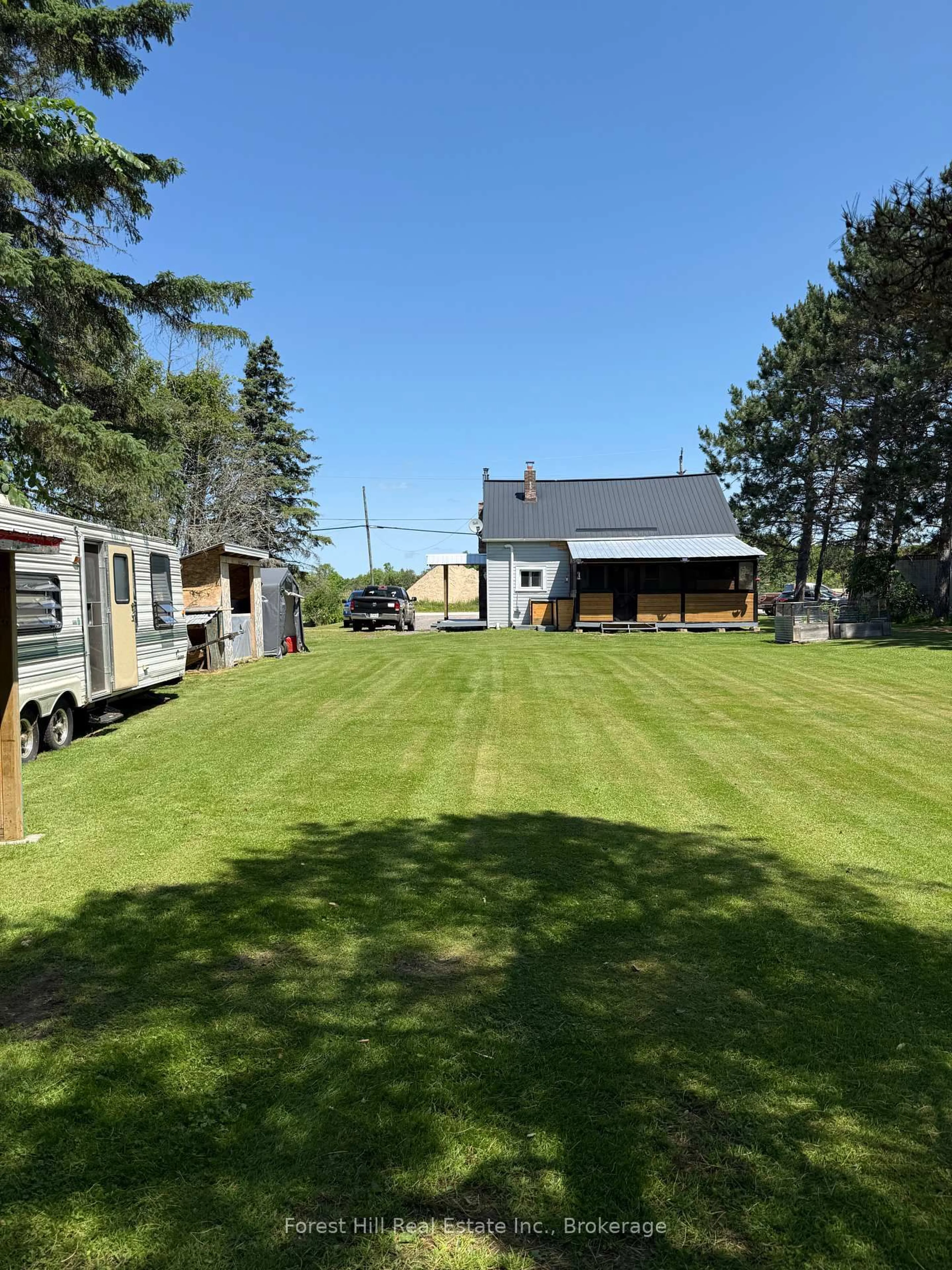 A pic from outside/outdoor area/front of a property/back of a property/a pic from drone, unknown for 10709 522 Highway, Parry Sound Remote Area Ontario P0H 1A0