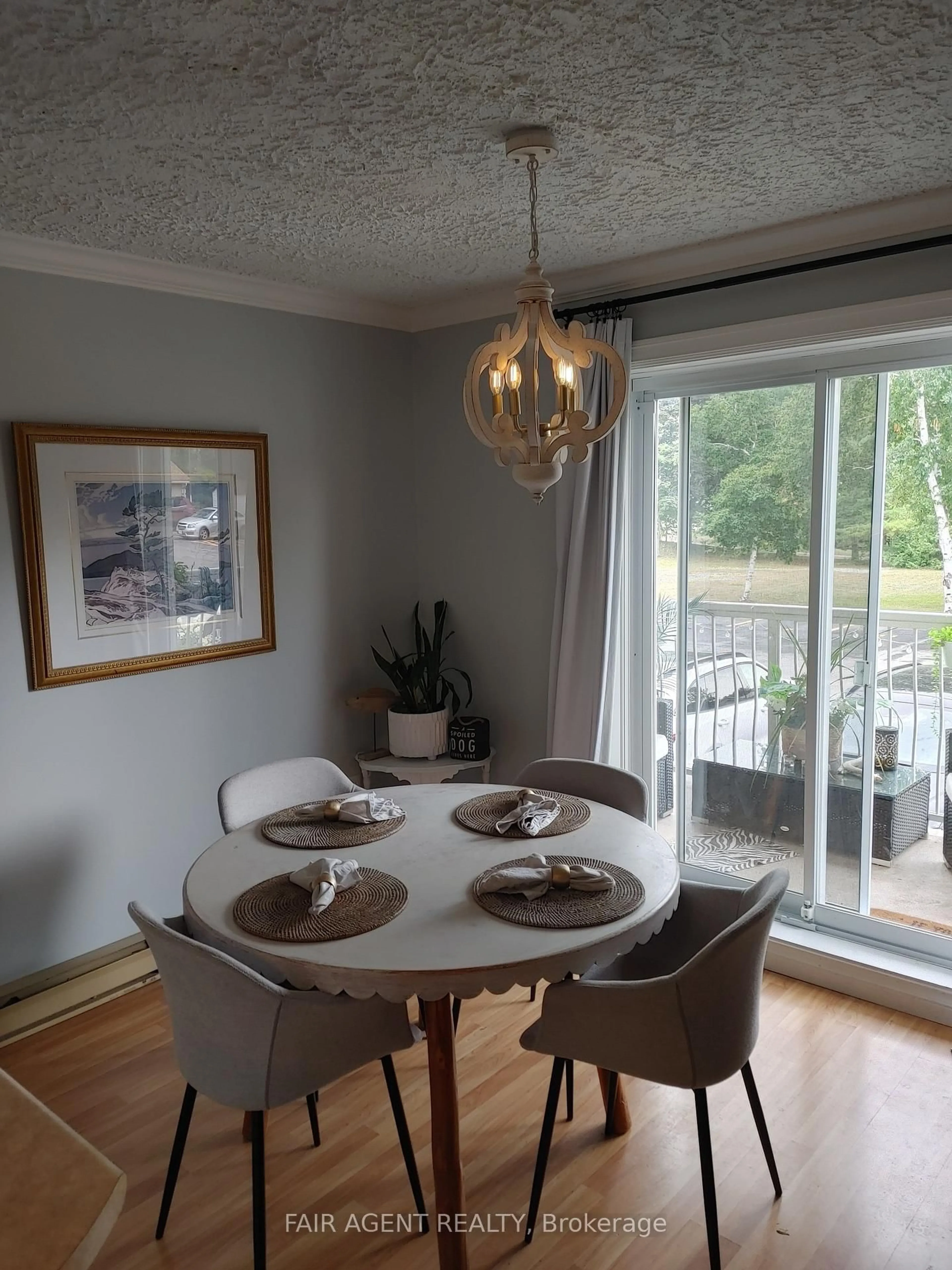 Dining room, wood/laminate floor for 229 Adelaide St #207, Saugeen Shores Ontario N0H 2L0