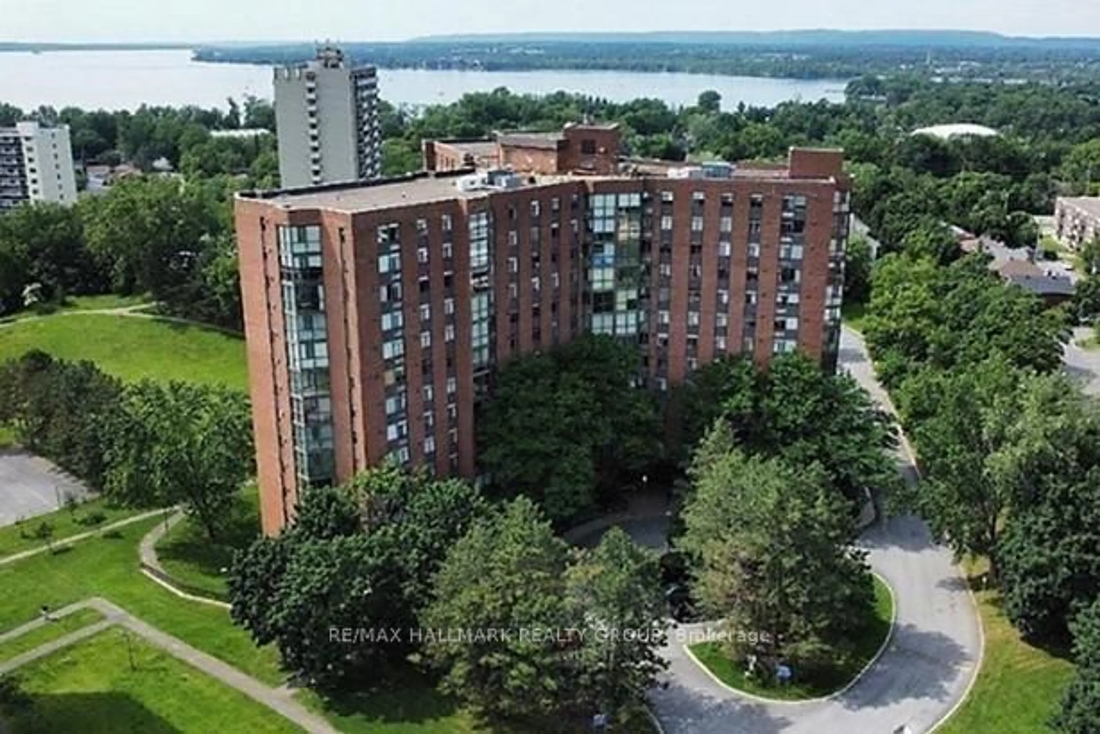 A pic from outside/outdoor area/front of a property/back of a property/a pic from drone, unknown for 2871 Richmond Rd #711, Ottawa Ontario K2B 8M5