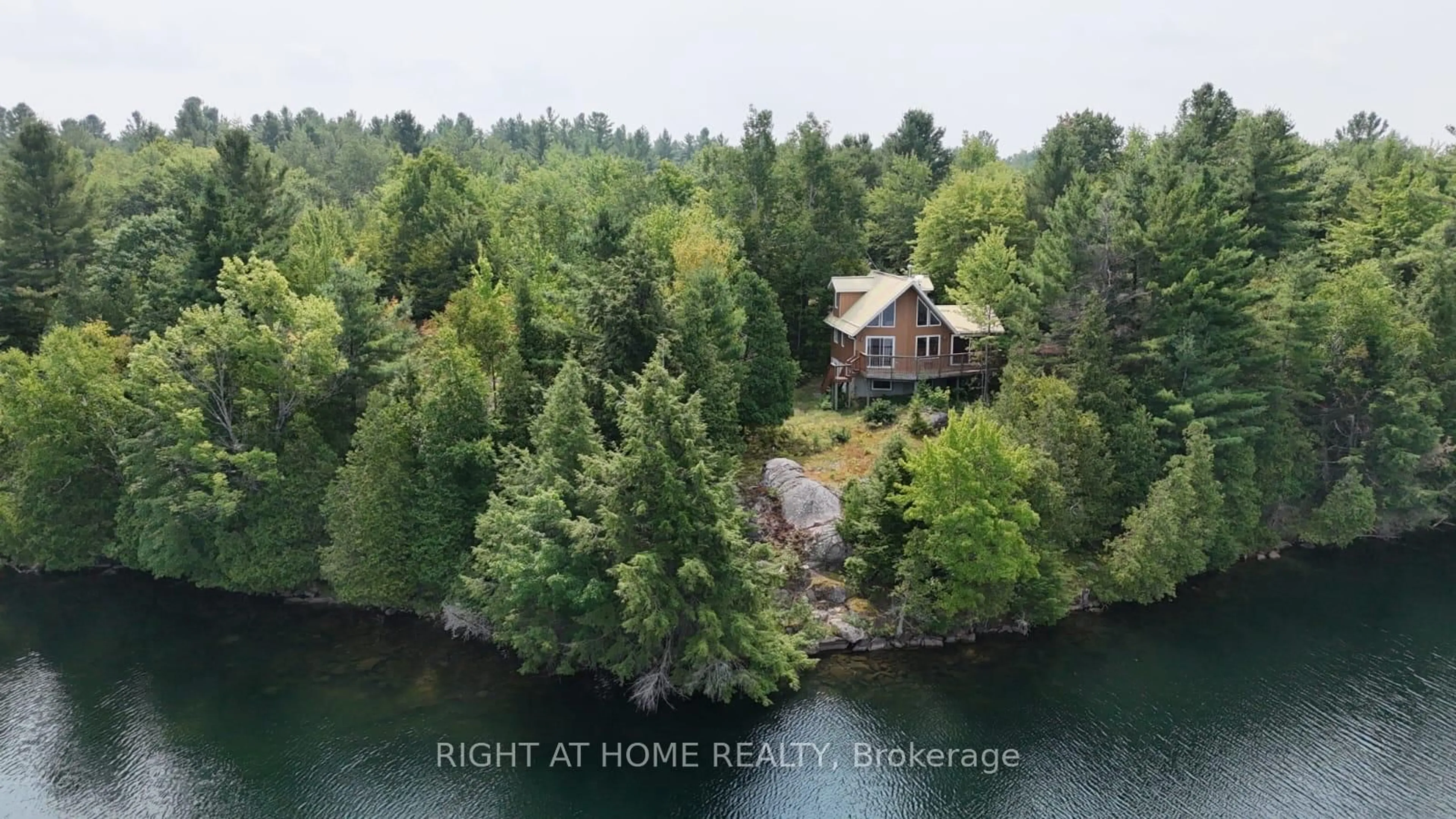 A pic from outside/outdoor area/front of a property/back of a property/a pic from drone, water/lake/river/ocean view for 1194 Two Loon Lane, Sharbot Lake Ontario K0H 2P0