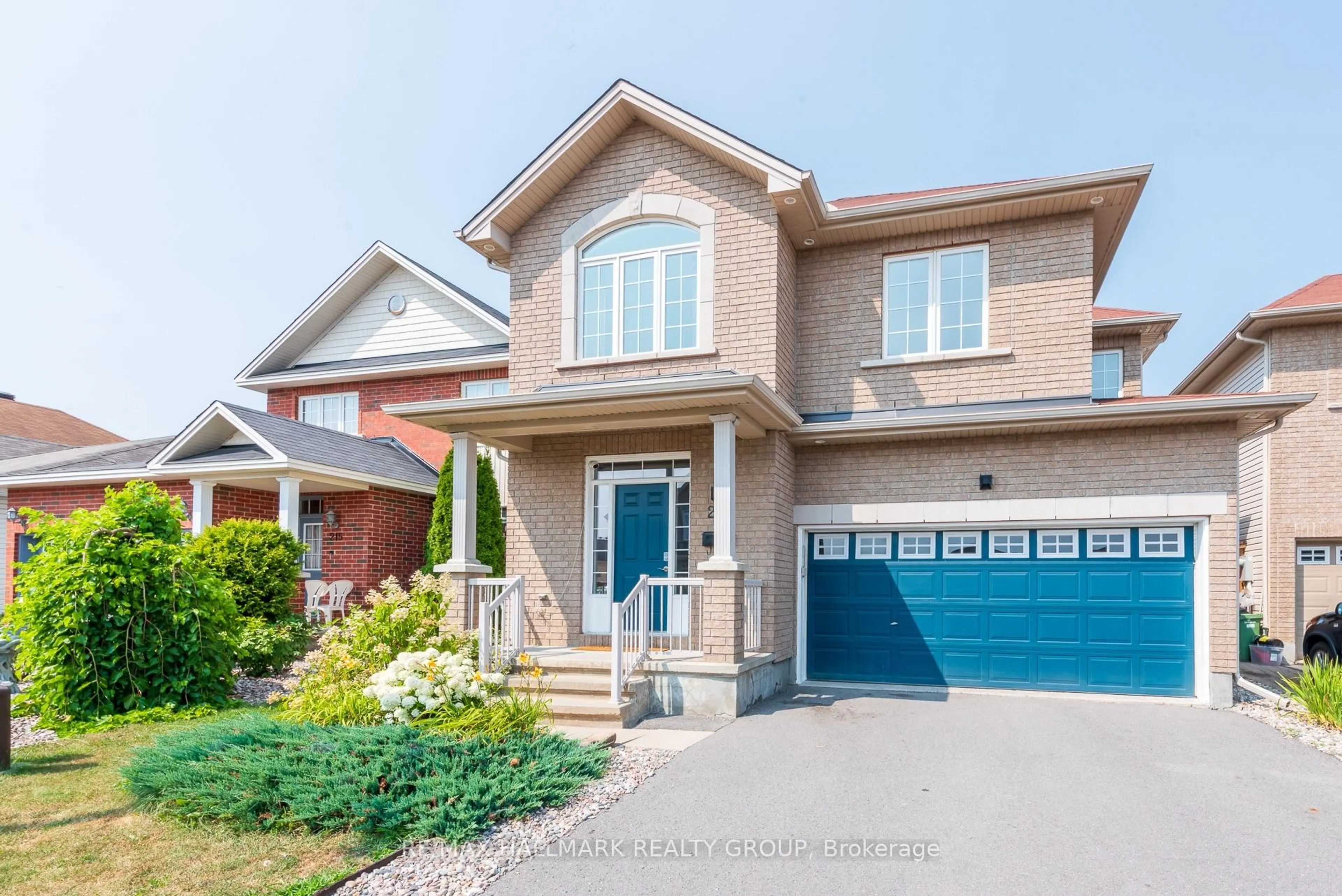 Home with brick exterior material, street for 217 Fountainhead Dr, Ottawa Ontario K1W 0C2