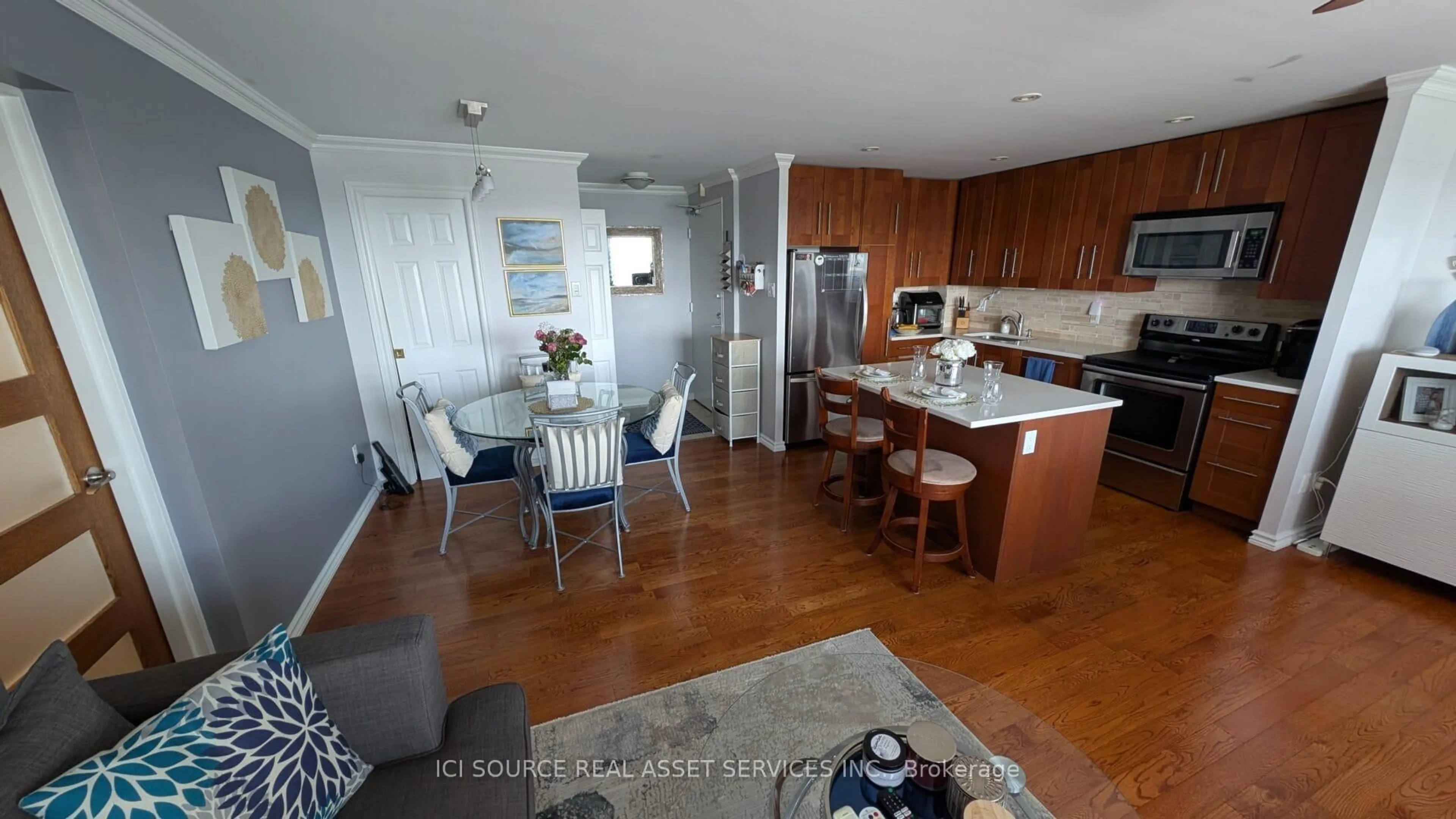 Open concept kitchen, ceramic/tile floor for 20 Chesterton Dr #711, Ottawa Ontario K2E 6Z7