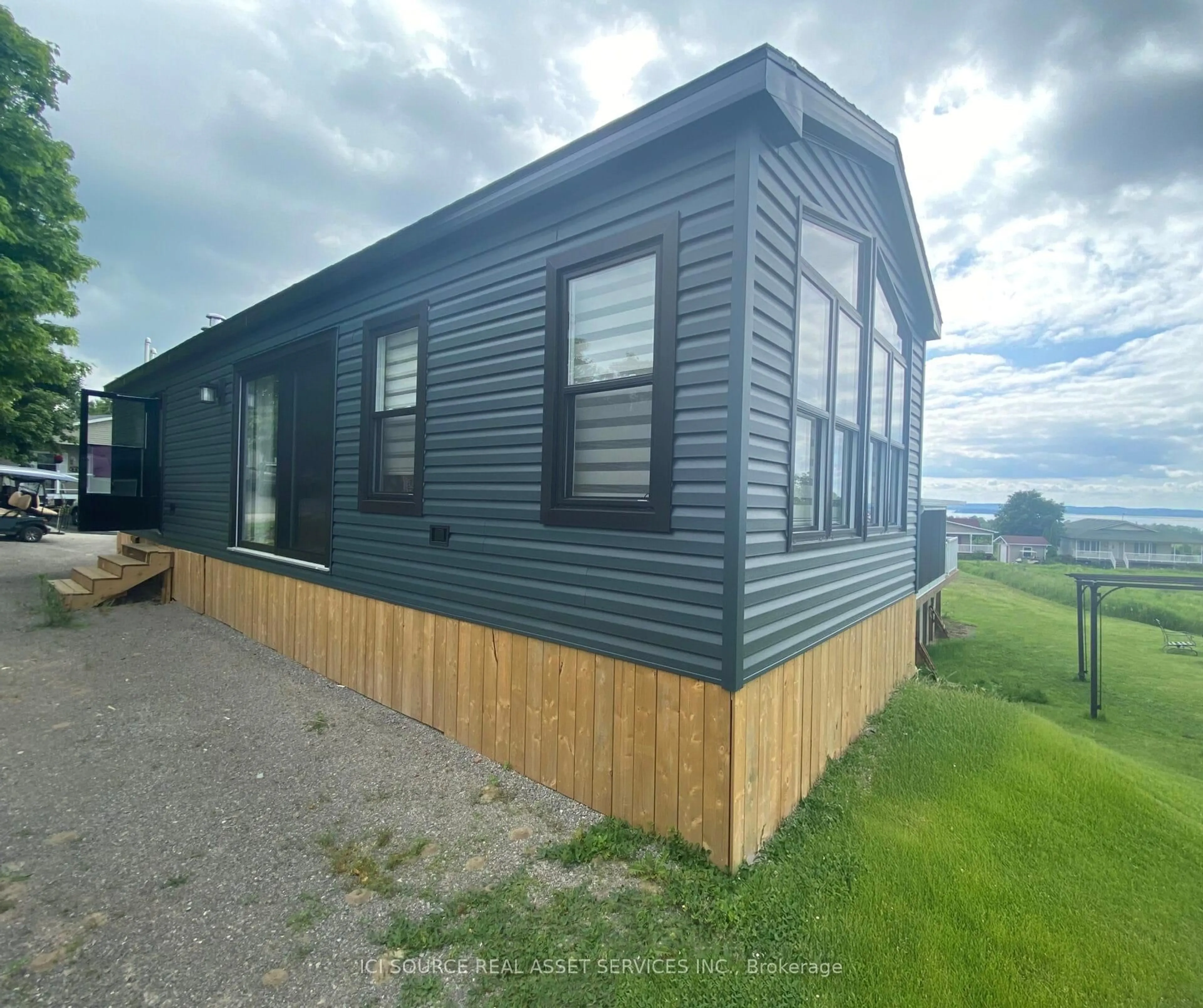 Home with vinyl exterior material, building for 1235 Villiers Line Rd #TRILM, Otonabee-South Monaghan Ontario K0L 2G0