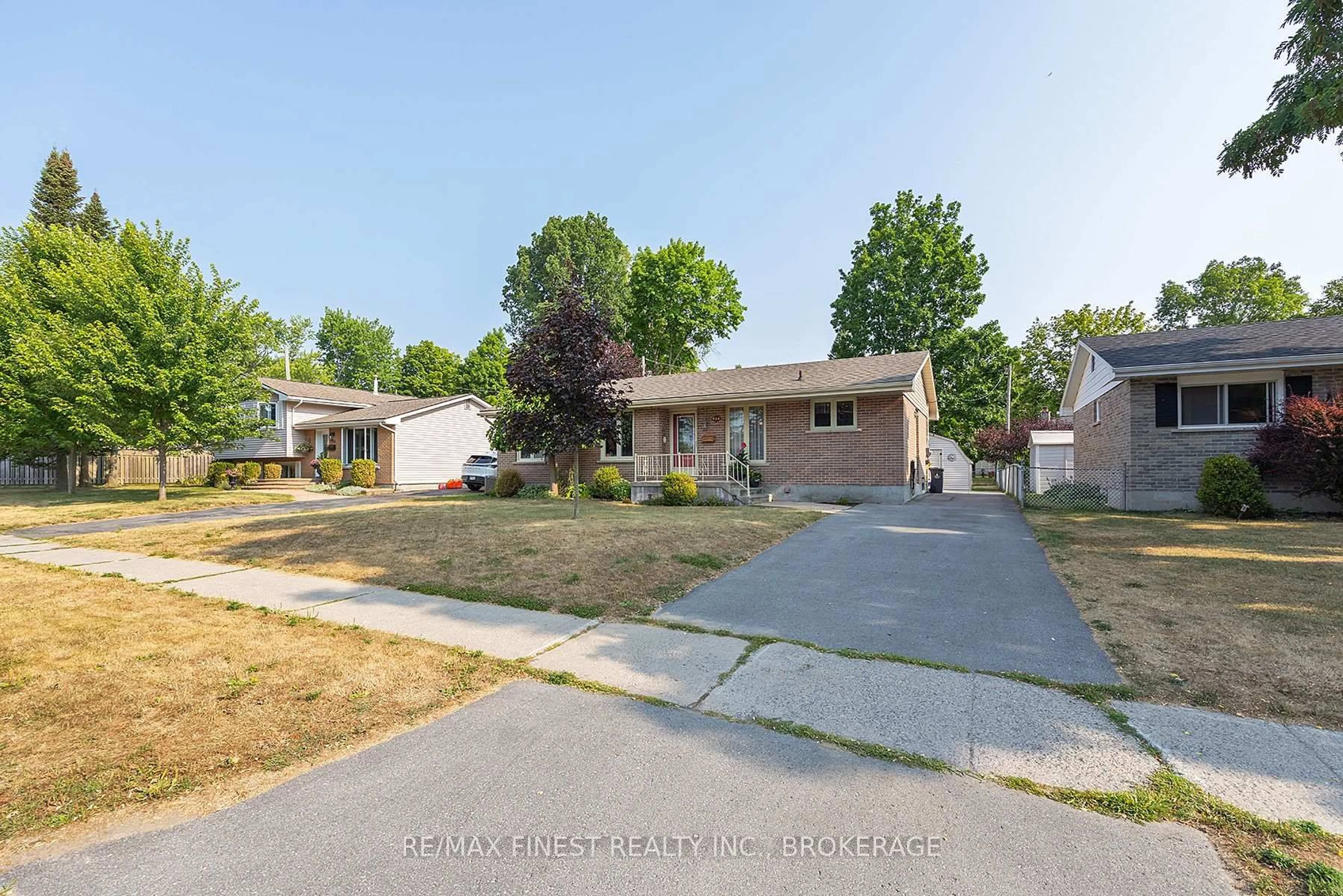 A pic from outside/outdoor area/front of a property/back of a property/a pic from drone, street for 984 Lincoln Dr, Kingston Ontario K7M 6N9