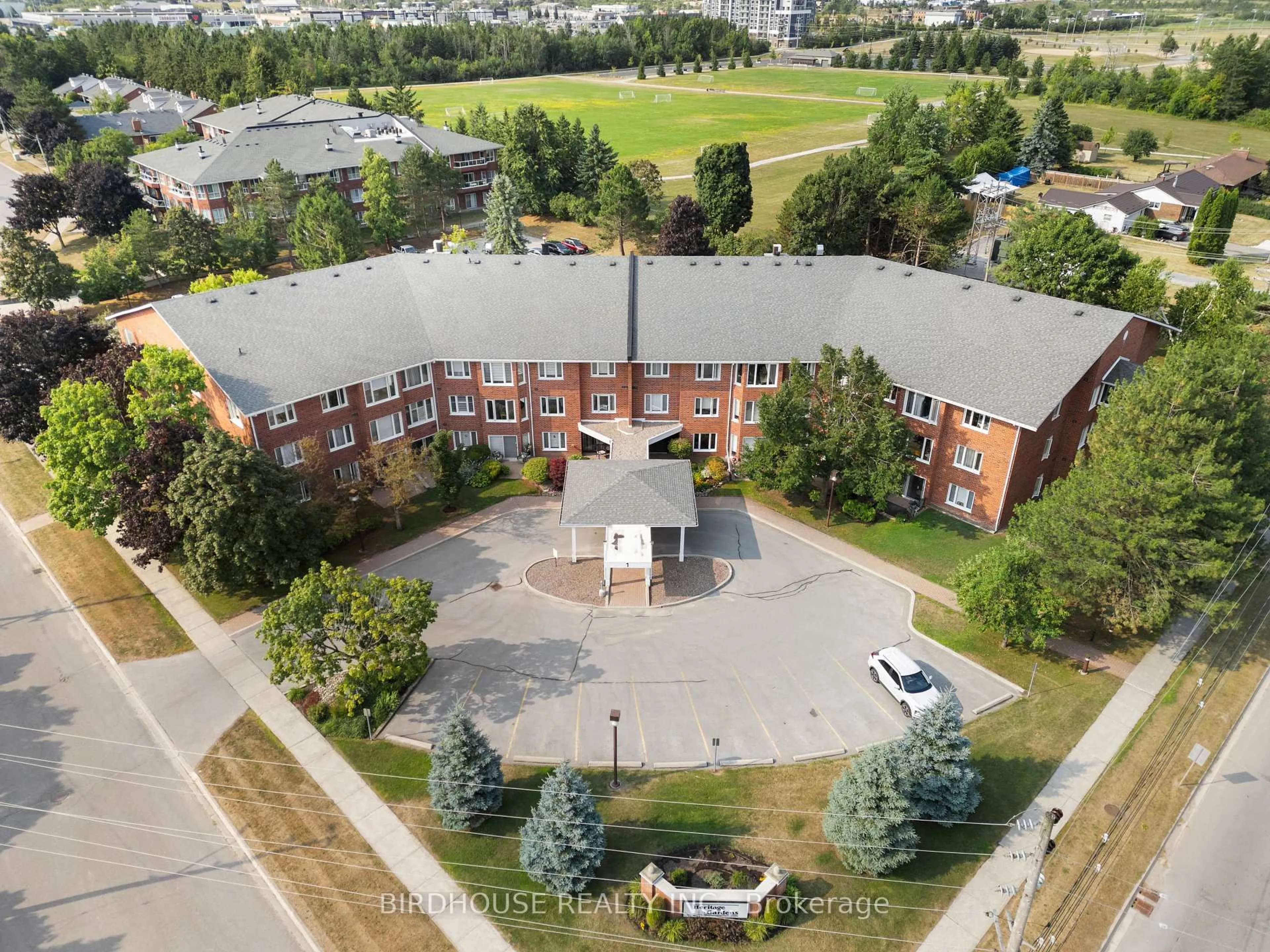 A pic from outside/outdoor area/front of a property/back of a property/a pic from drone, unknown for 1 Heritage Way #109, Kawartha Lakes Ontario K9V 5P9