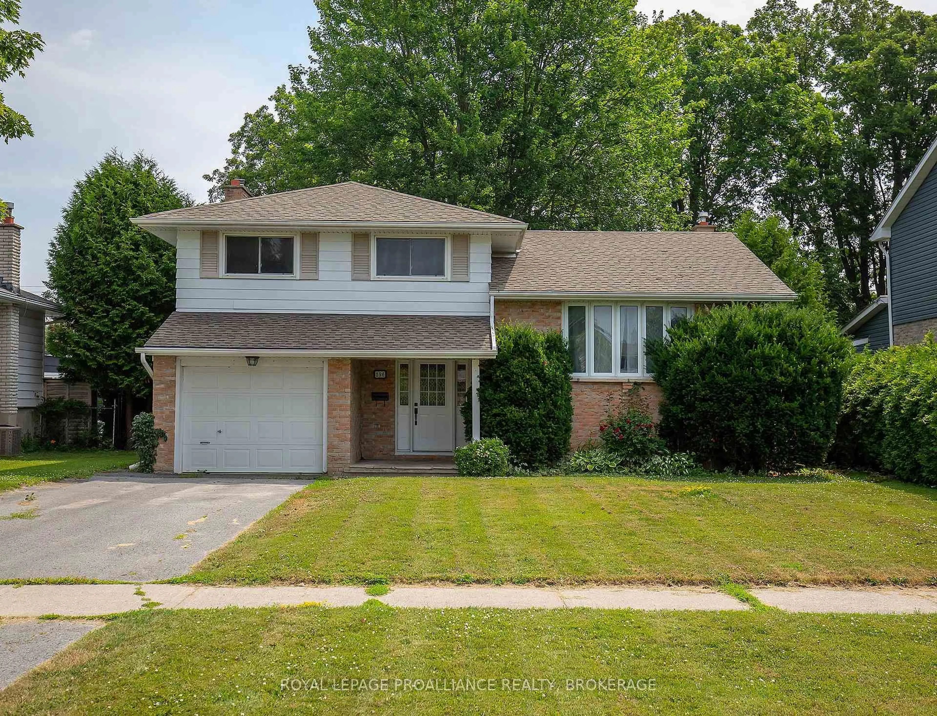 Home with brick exterior material, street for 296 Olympus Ave, Kingston Ontario K7M 4T9