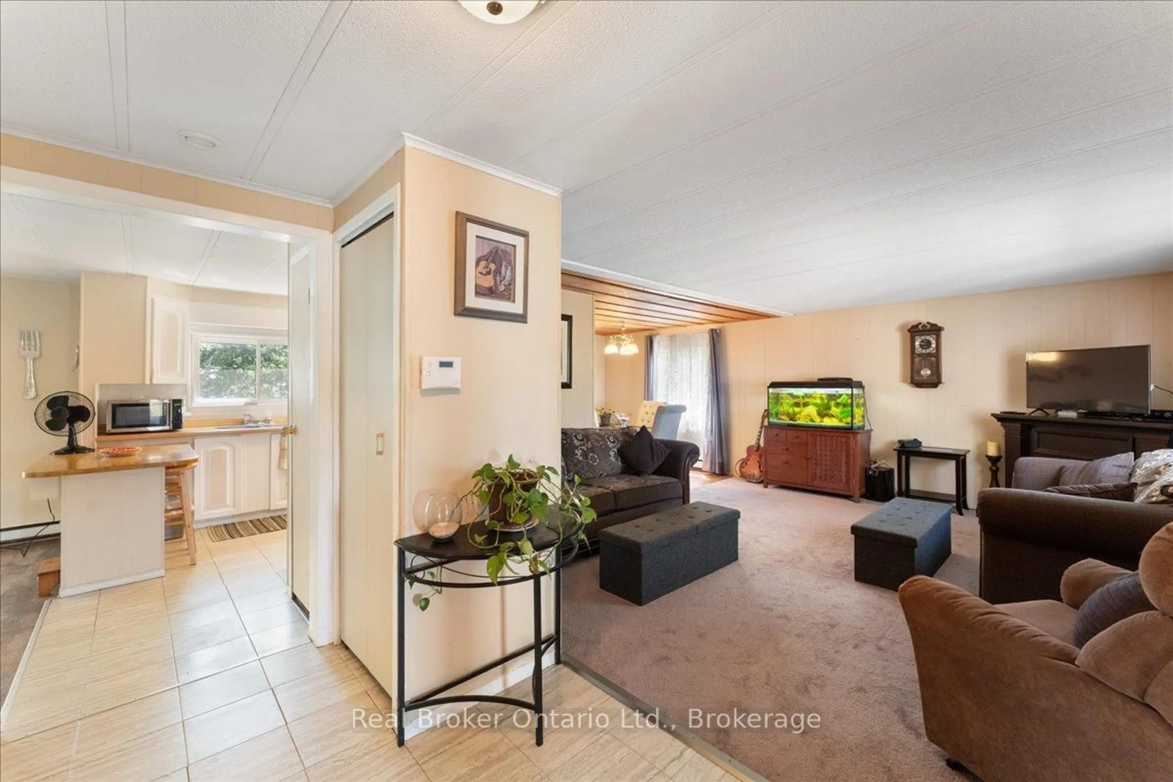 Living room with furniture, ceramic/tile floor for 241 St. Paul St #241, St. Catharines Ontario L2S 2E5