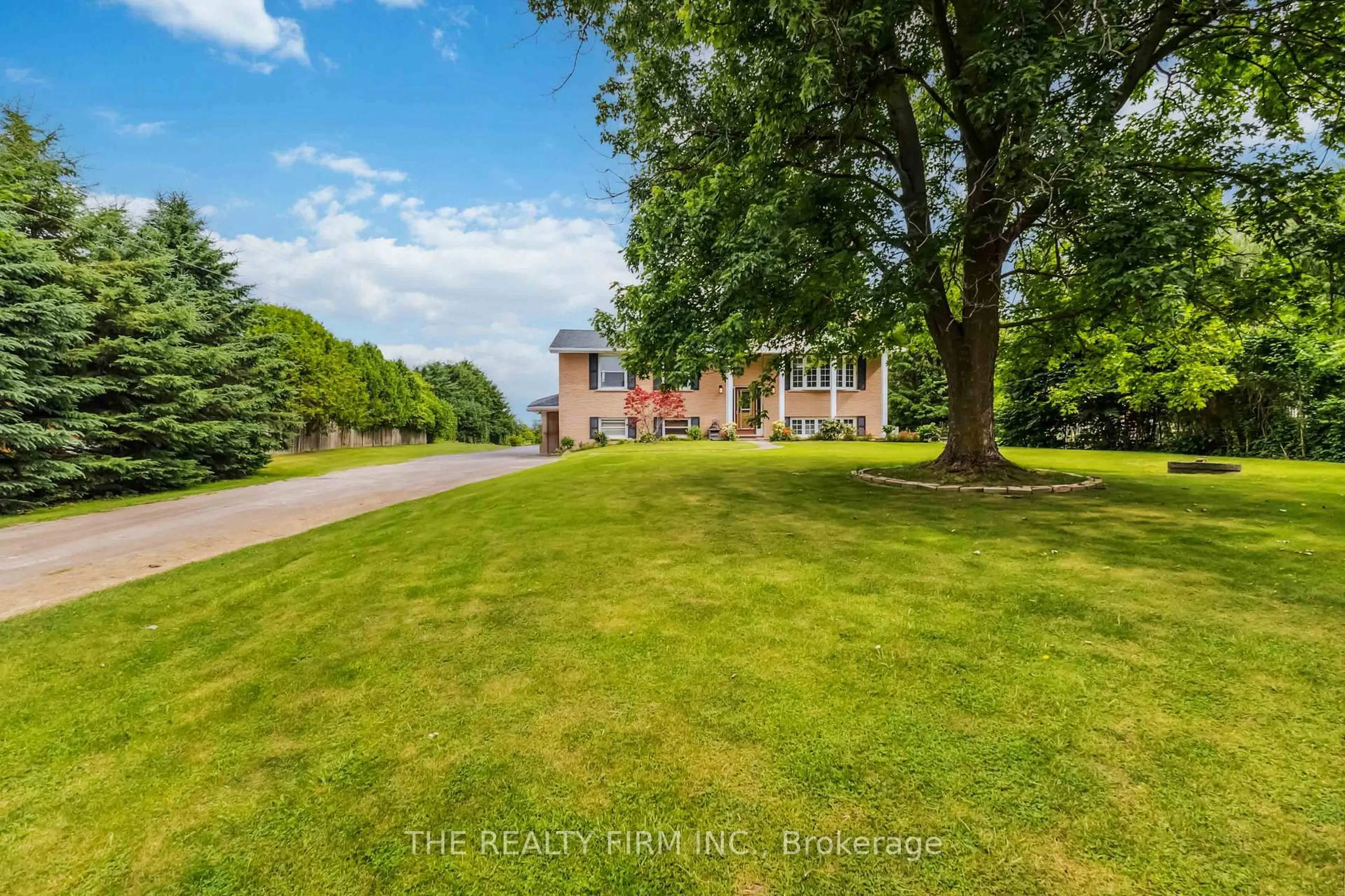 A pic from outside/outdoor area/front of a property/back of a property/a pic from drone, street for 15552 Elginfield Rd, Lucan Biddulph Ontario N0M 1V0