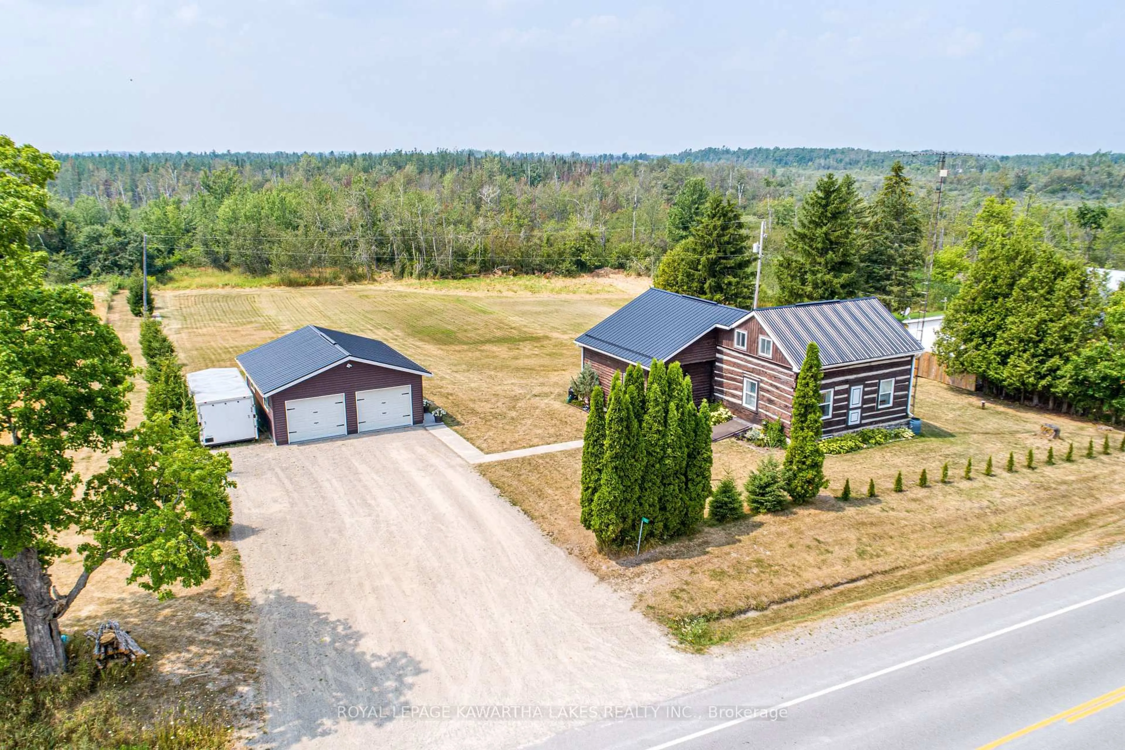A pic from outside/outdoor area/front of a property/back of a property/a pic from drone, unknown for 1183 Eldon Rd, Kawartha Lakes Ontario K0M 2M0