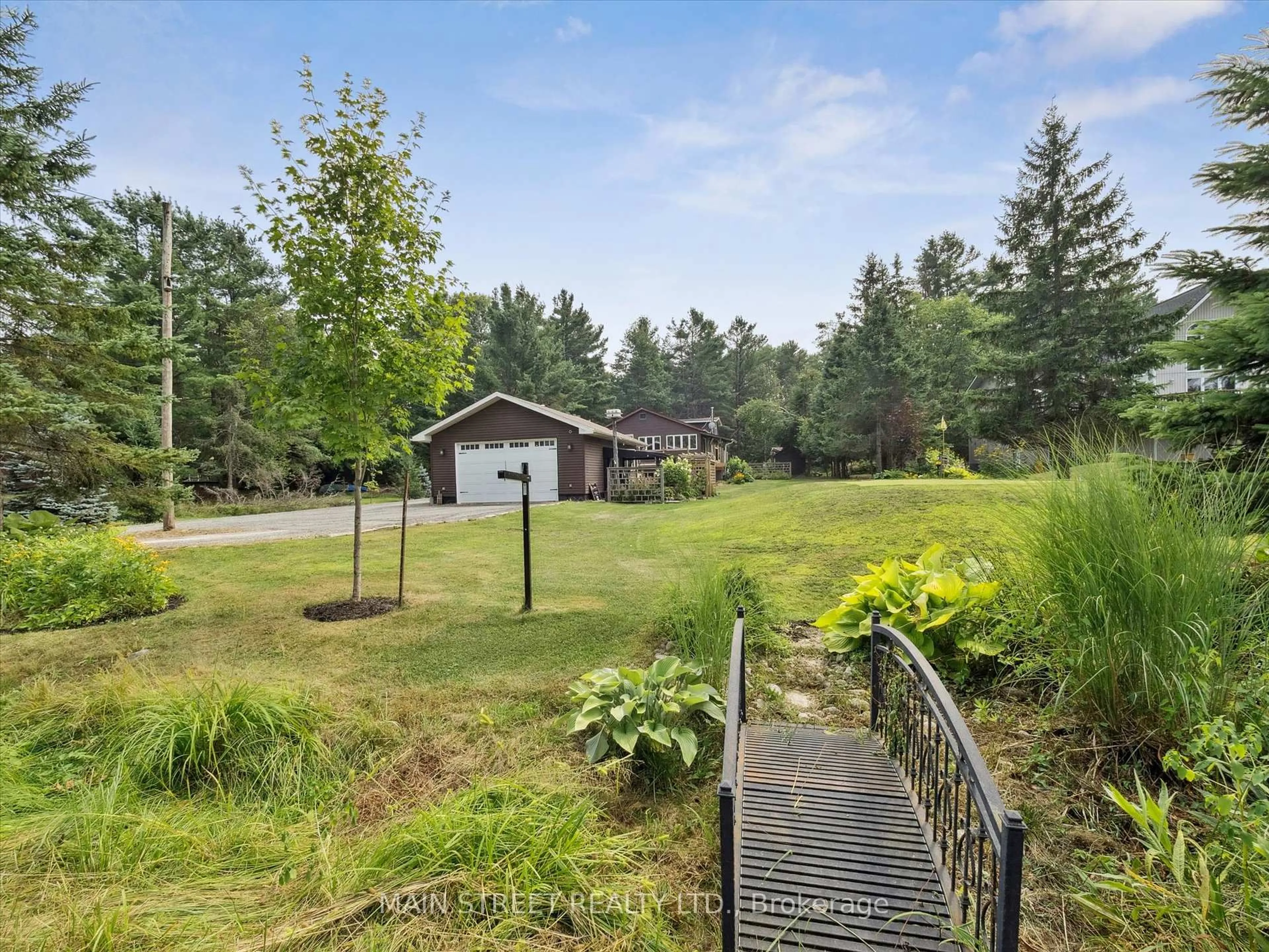 A pic from outside/outdoor area/front of a property/back of a property/a pic from drone, forest/trees view for 1183 South Morrison Lake Rd, Gravenhurst Ontario P0E 1G0
