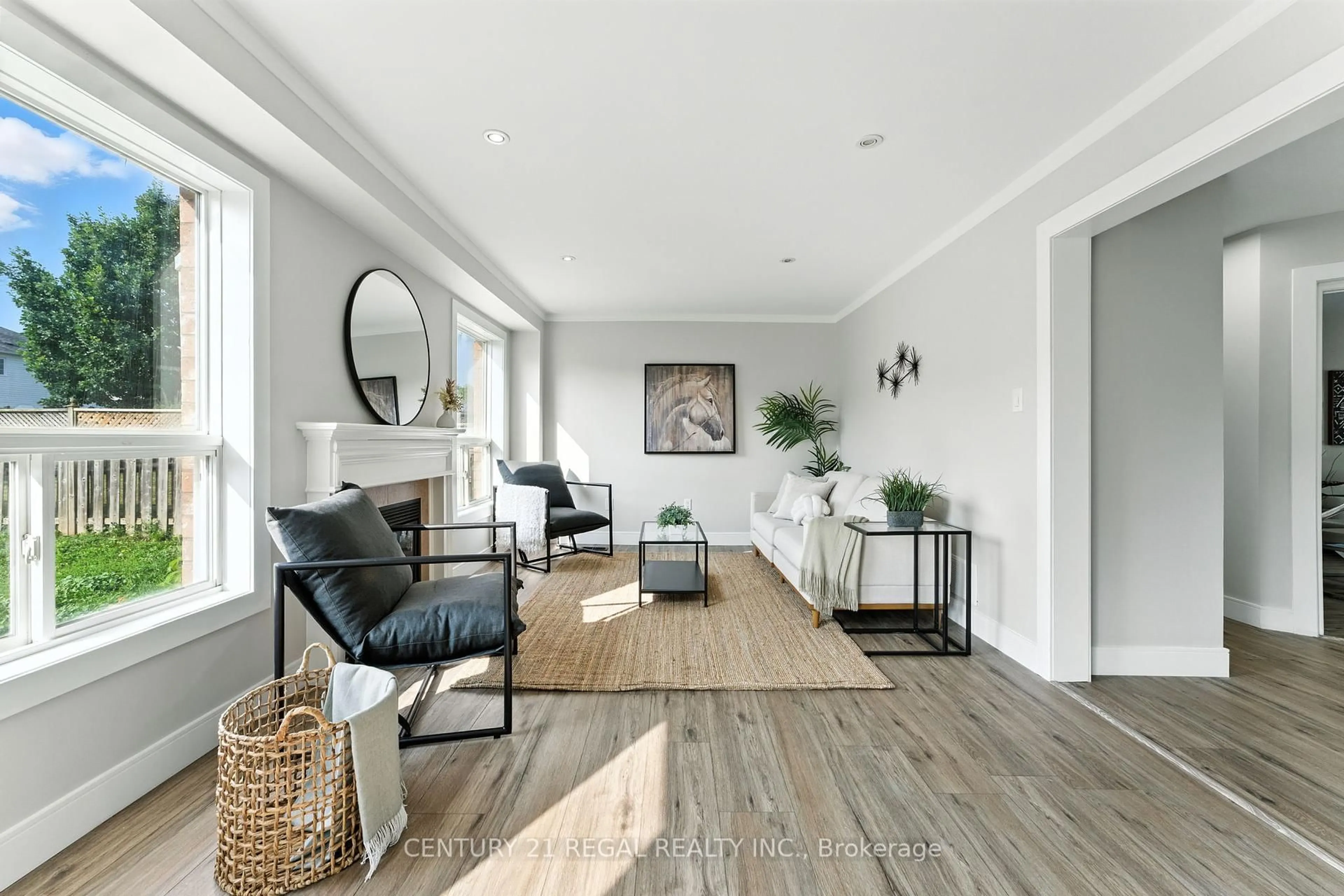 Living room with furniture, wood/laminate floor for 97 Osborn Ave, Brant Ontario N3T 6R3