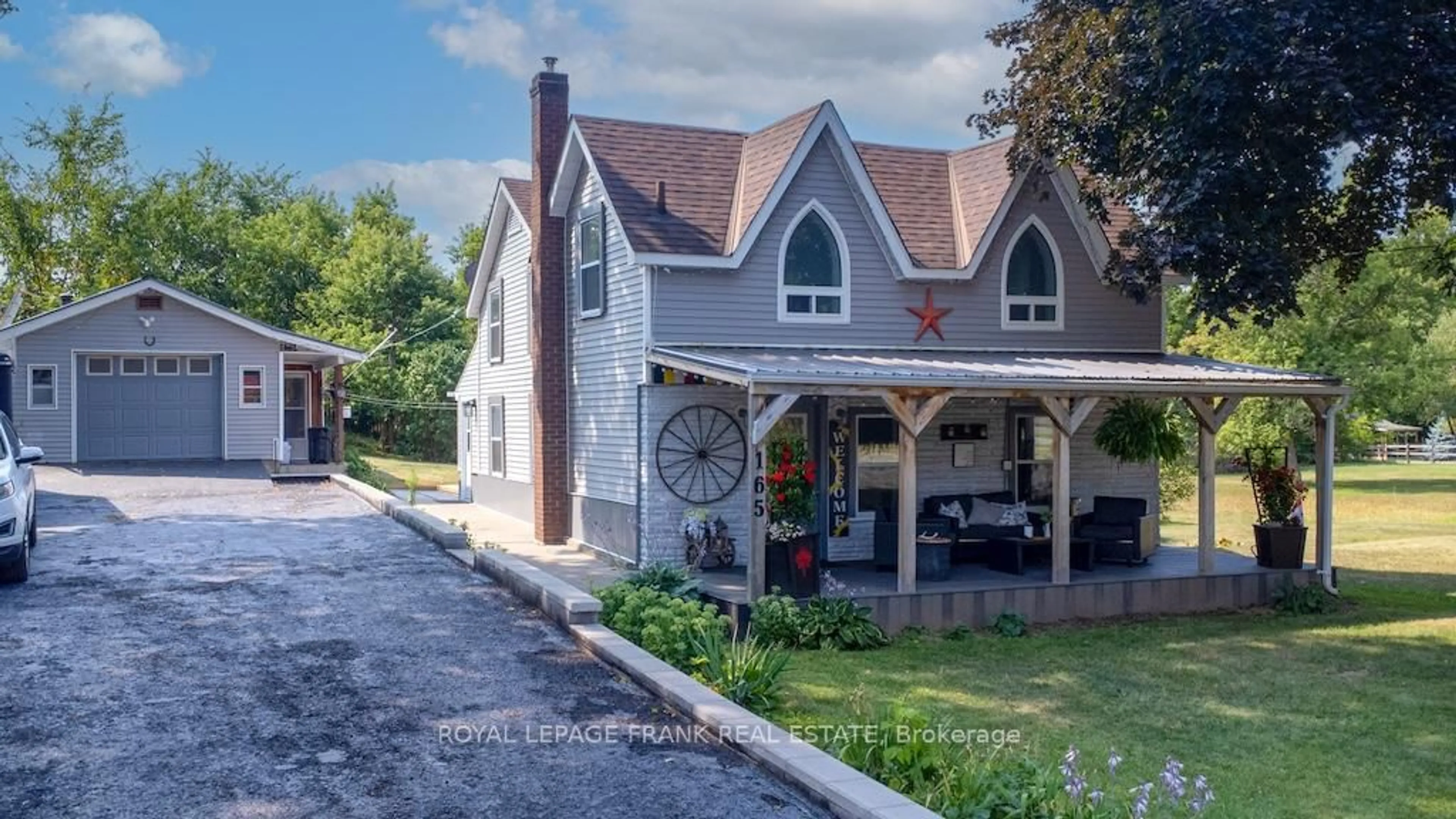 A pic from outside/outdoor area/front of a property/back of a property/a pic from drone, street for 165 St Lawrence St, Madoc Ontario K0K 2K0