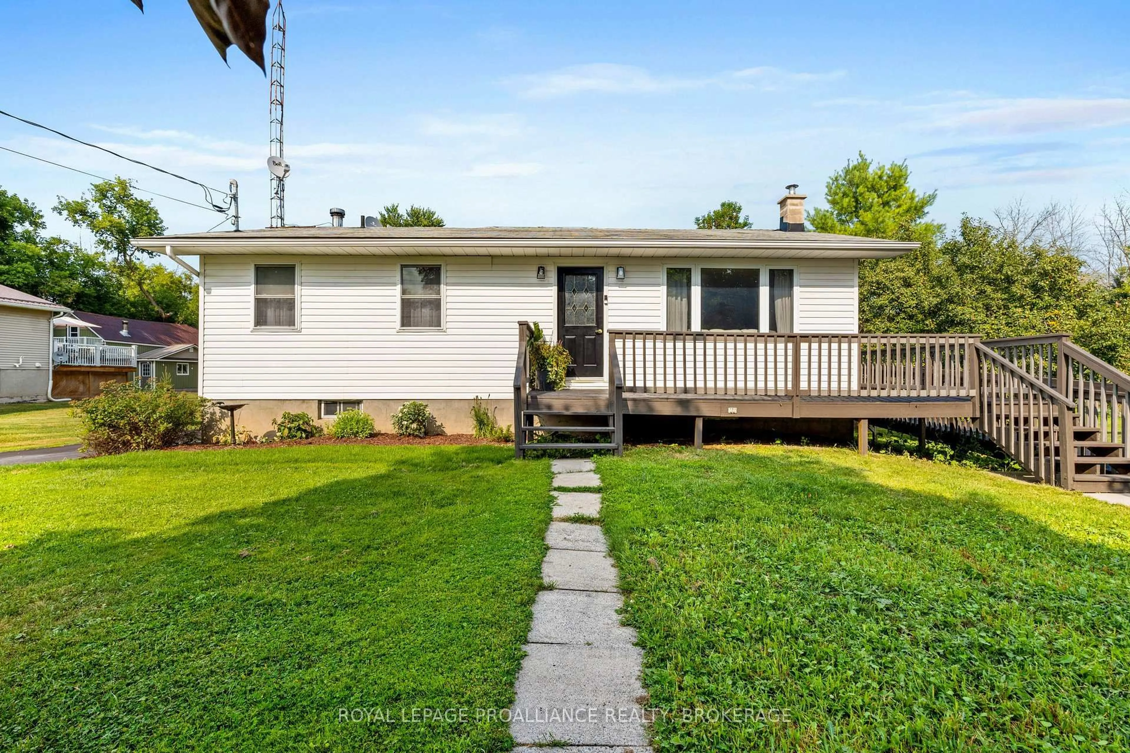 Home with vinyl exterior material, street for 1544 Lake Rd, Kaladar Ontario K0K 1Z0