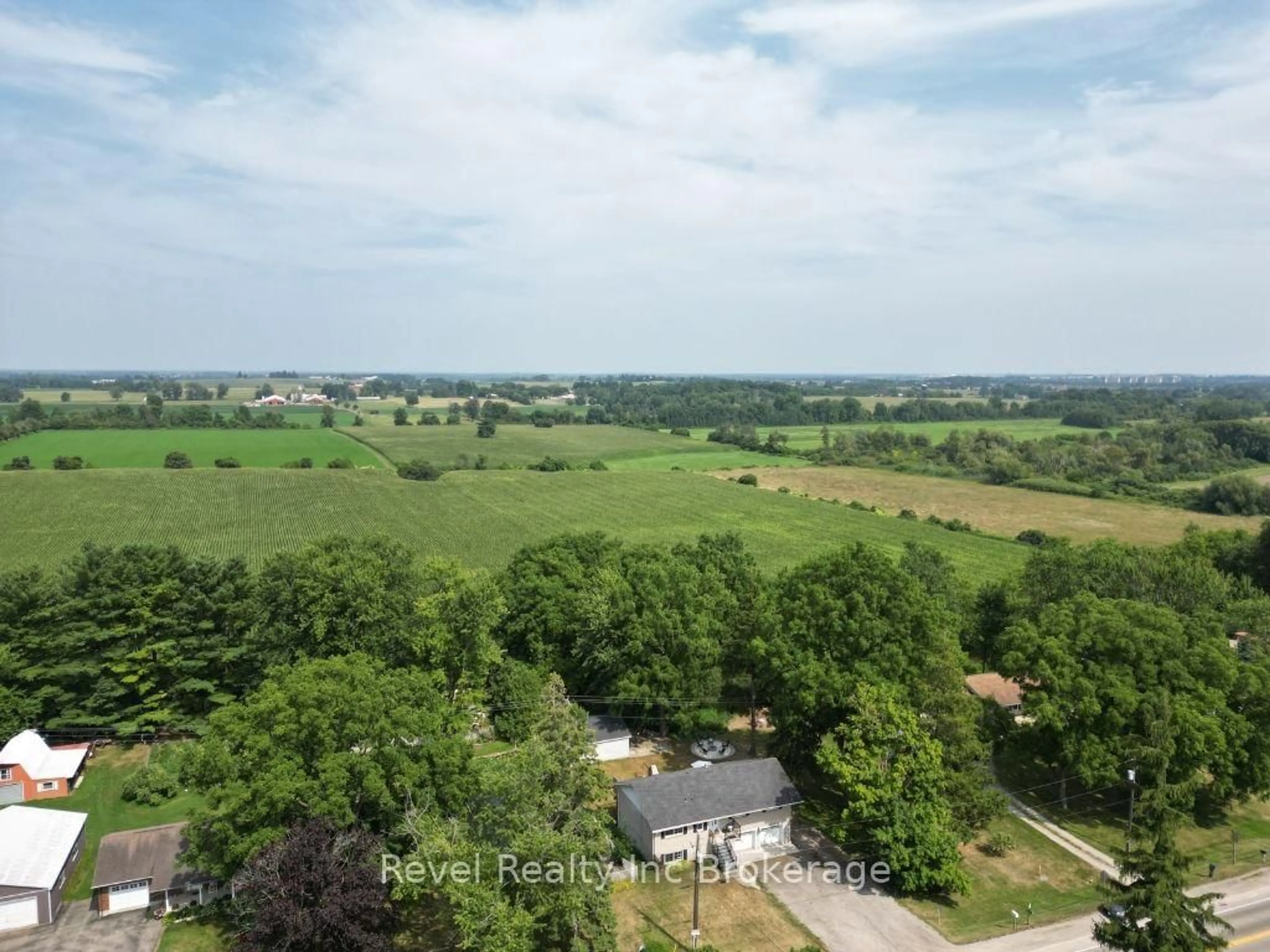 A pic from outside/outdoor area/front of a property/back of a property/a pic from drone, unknown for 595480 59 Highway, East Zorra-Tavistock Ontario N4S 7W1
