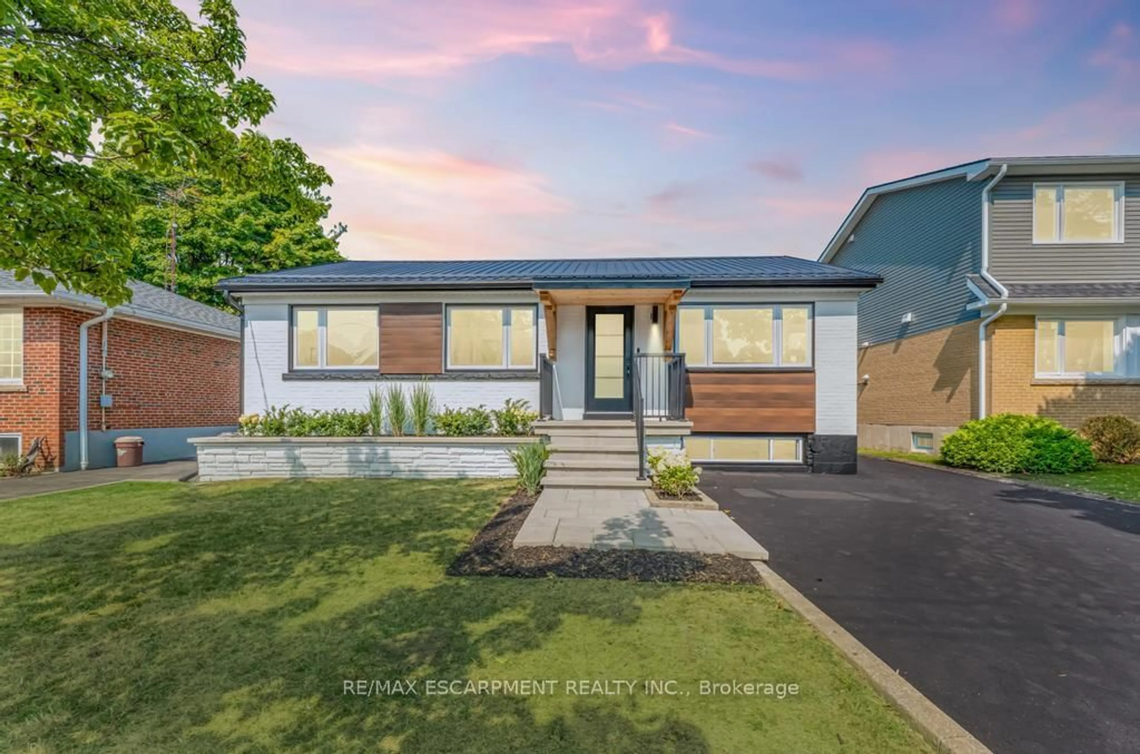 Home with brick exterior material, street for 48 Ferrara St, Hamilton Ontario L8T 4C4