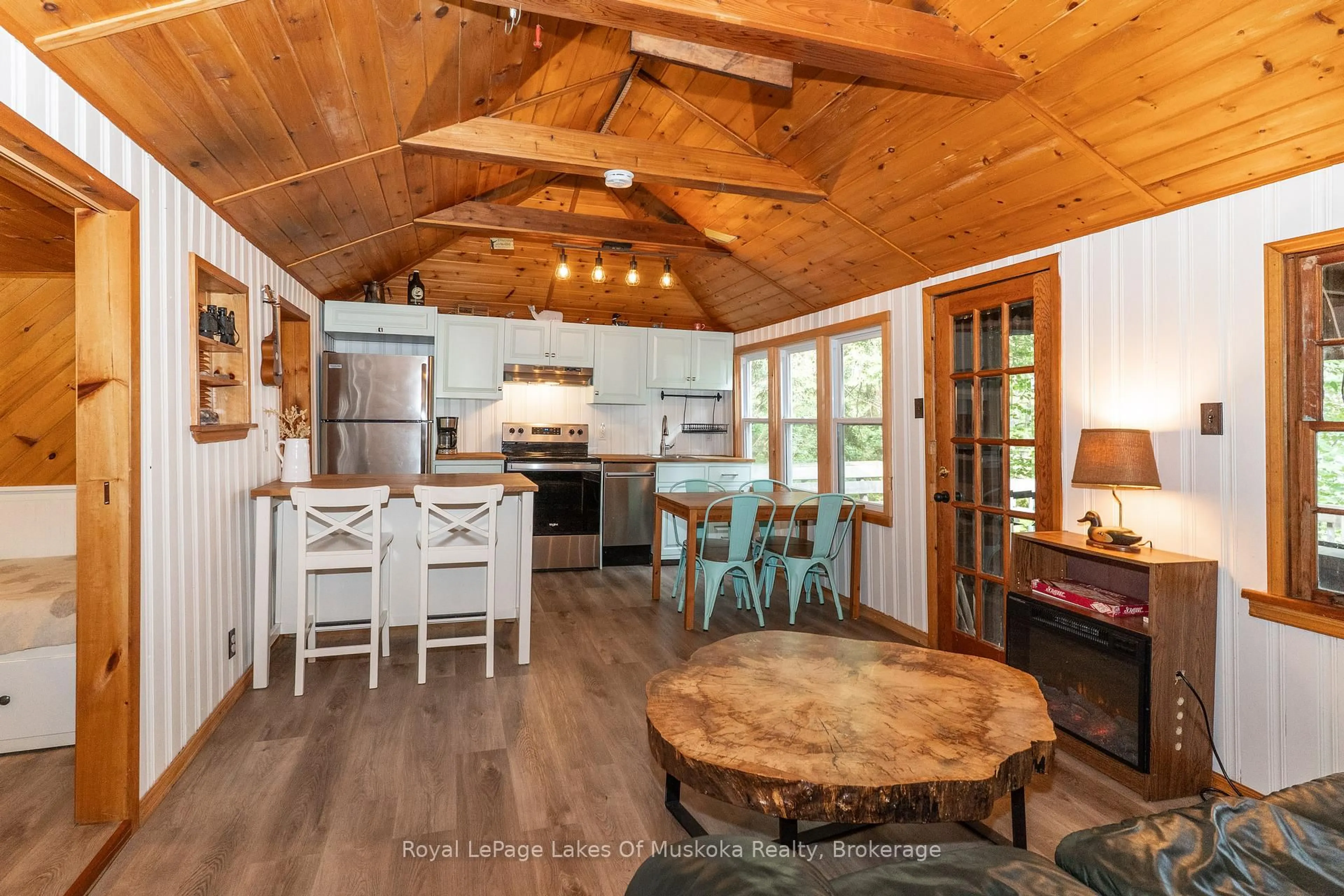 Open concept kitchen, wood/laminate floor for 1072 Long Lake Rd, Muskoka Lakes Ontario P0C 1A0