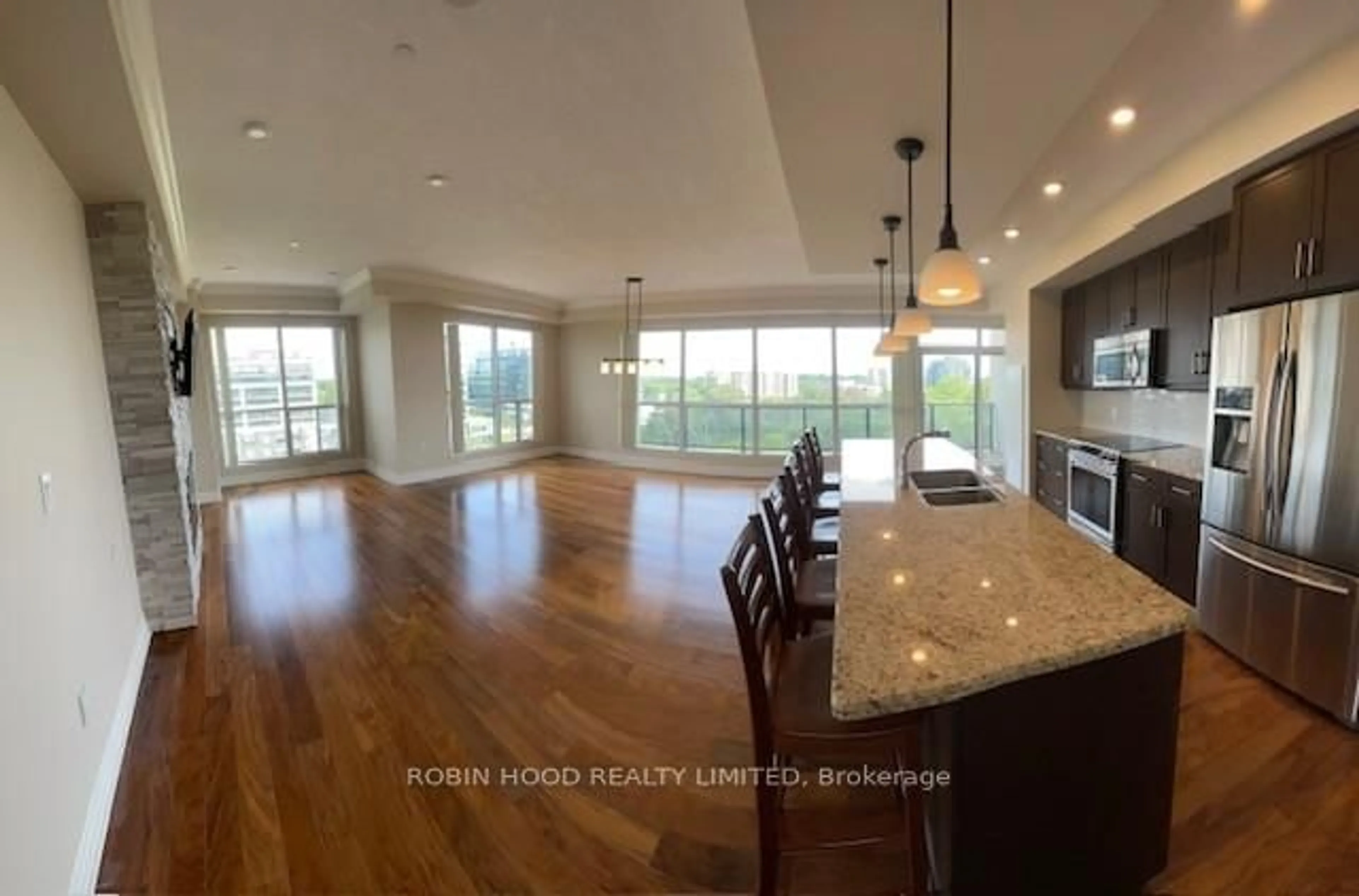 Open concept kitchen, wood/laminate floor for 150 Wellington St #612, Guelph Ontario N1H 3R2