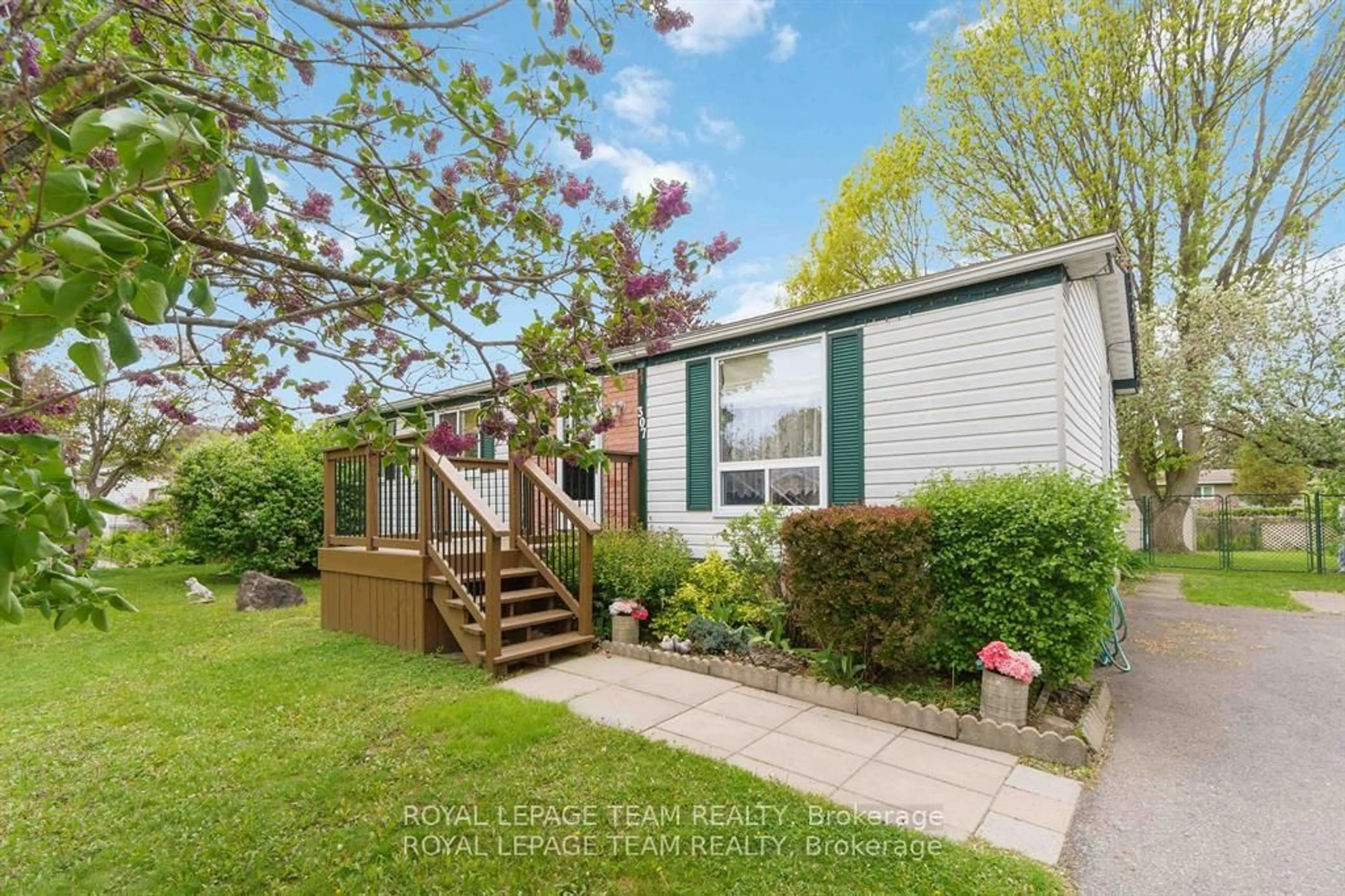 Home with vinyl exterior material, street for 307 Dodson St, North Grenville Ontario K0G 1J0