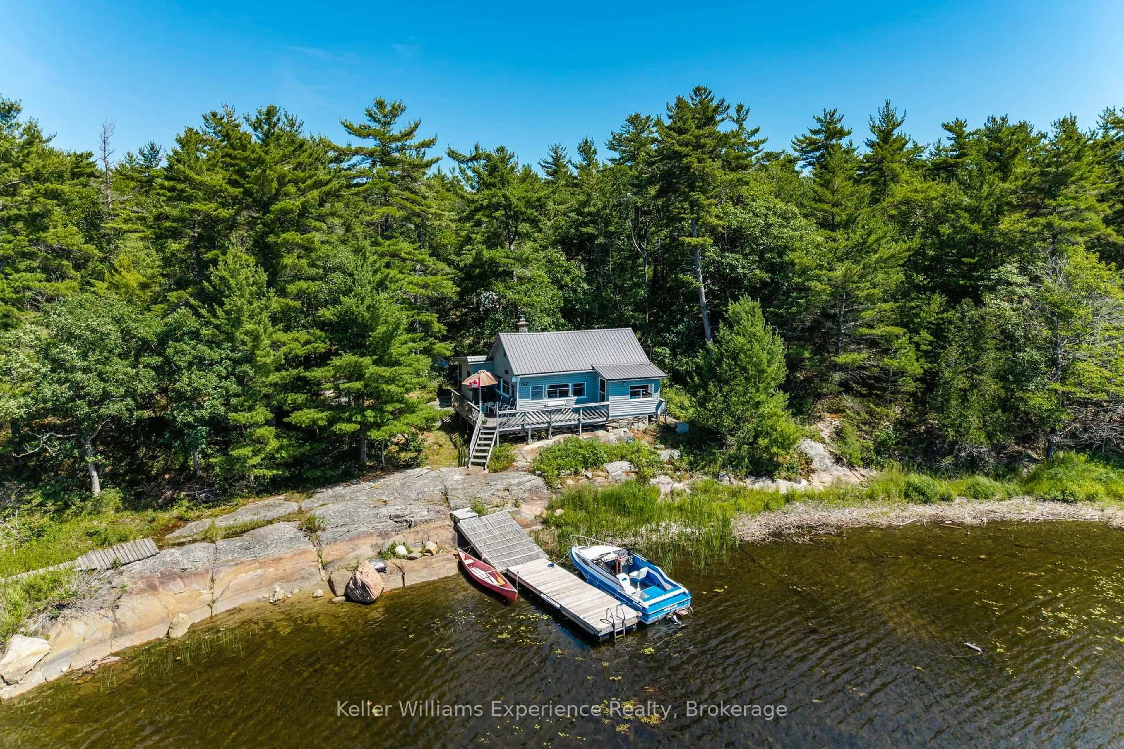 A pic from outside/outdoor area/front of a property/back of a property/a pic from drone, water/lake/river/ocean view for 8326 Is 2210 Georgian Bay, Georgian Bay Ontario P0E 1E0