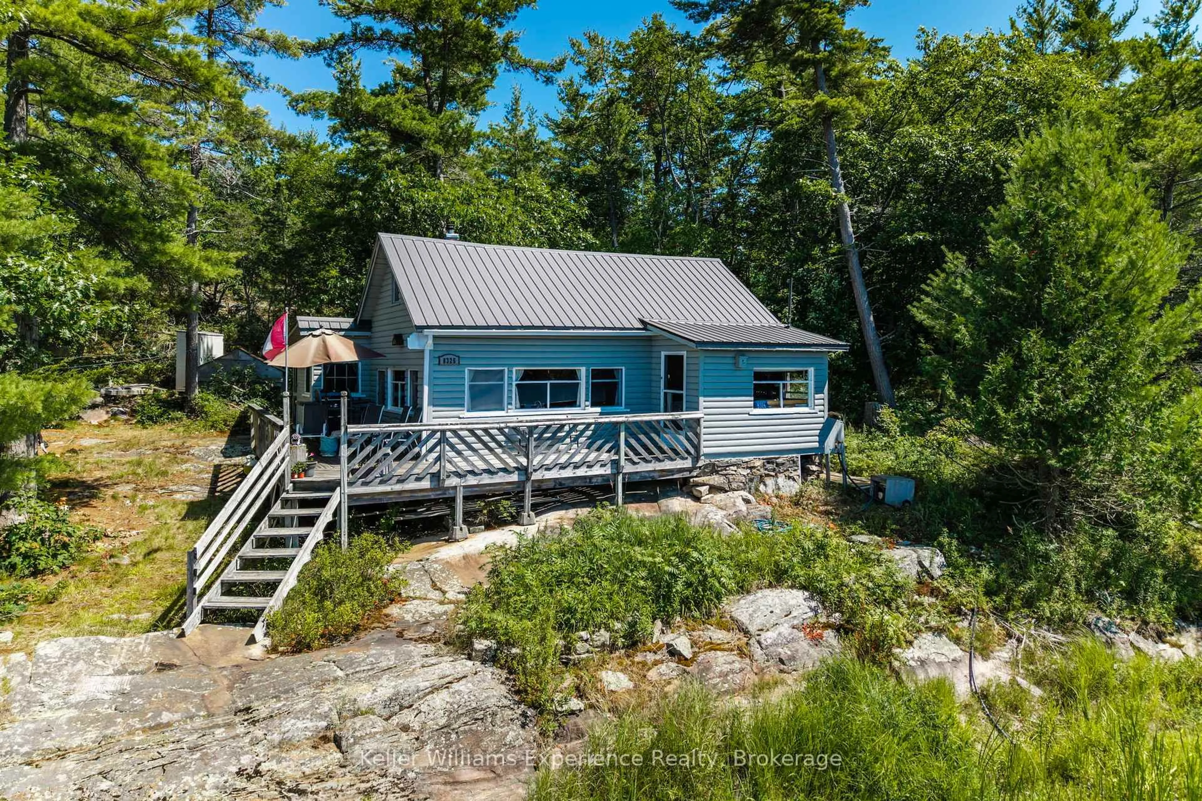 A pic from outside/outdoor area/front of a property/back of a property/a pic from drone, water/lake/river/ocean view for 8326 Is 2210 Georgian Bay, Georgian Bay Ontario P0E 1E0