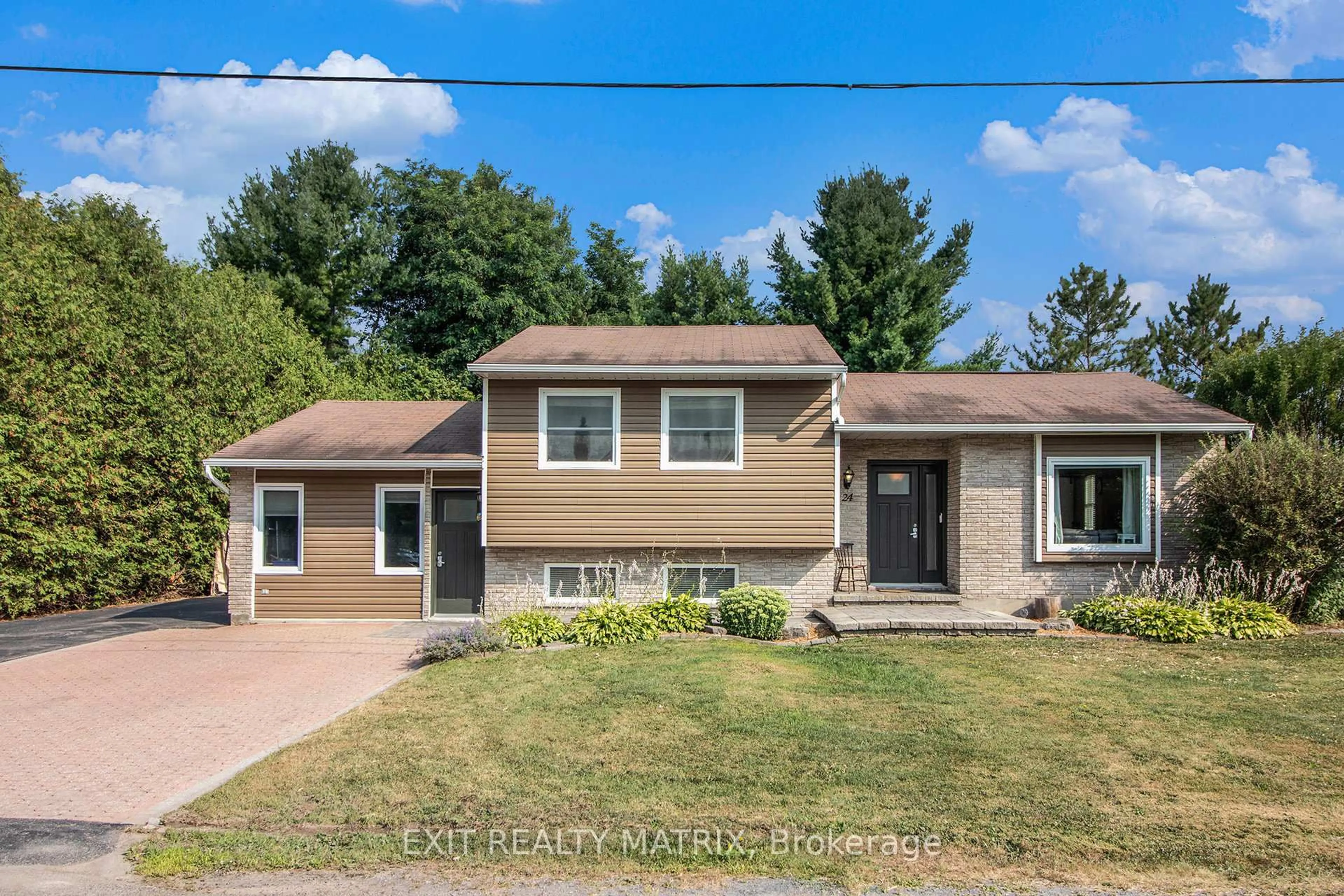 Home with vinyl exterior material, street for 24 Ste Therese Blvd, Russell Ontario K0A 1W0
