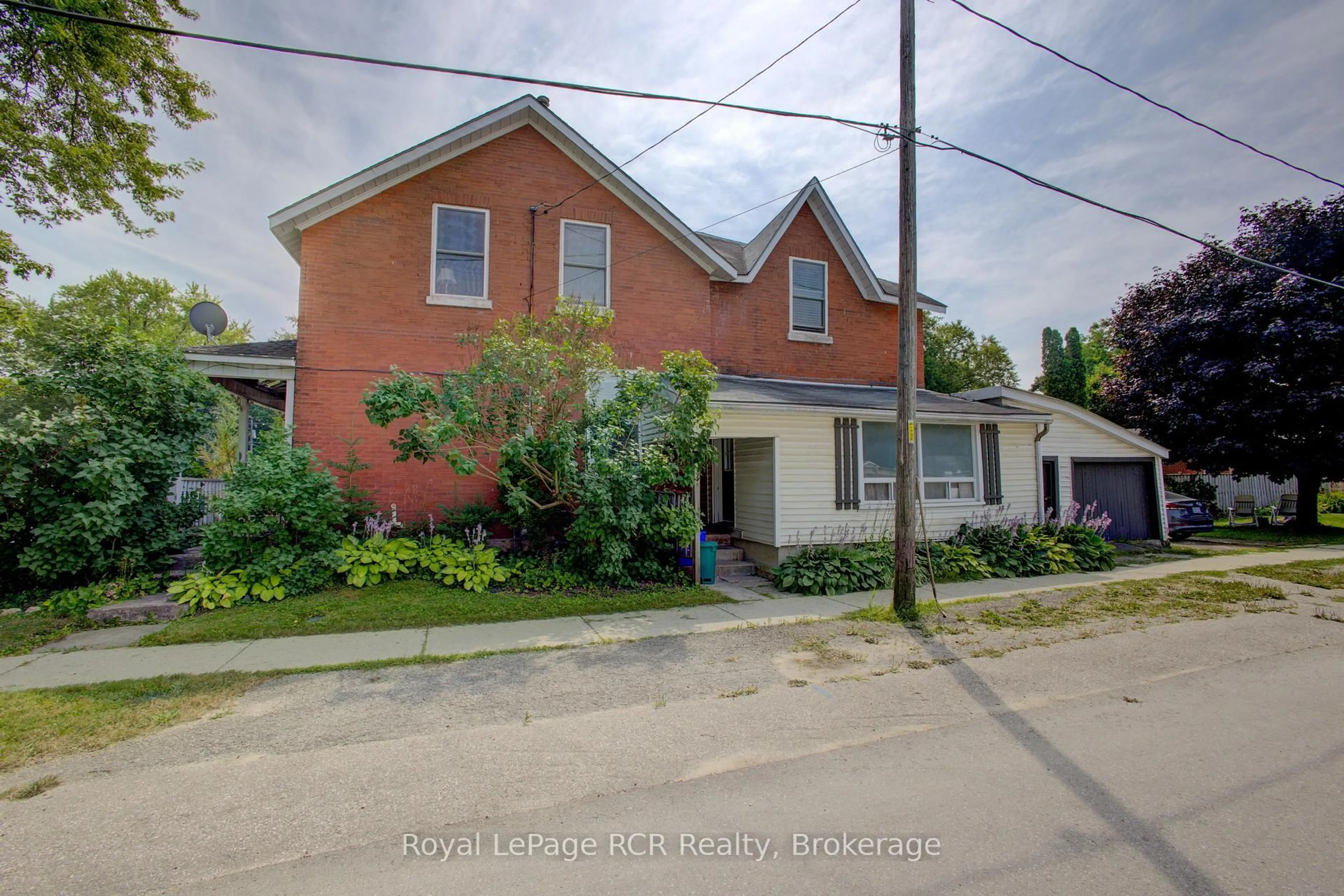 A pic from outside/outdoor area/front of a property/back of a property/a pic from drone, street for 231 Tucker St, Wellington North Ontario N0G 1A0
