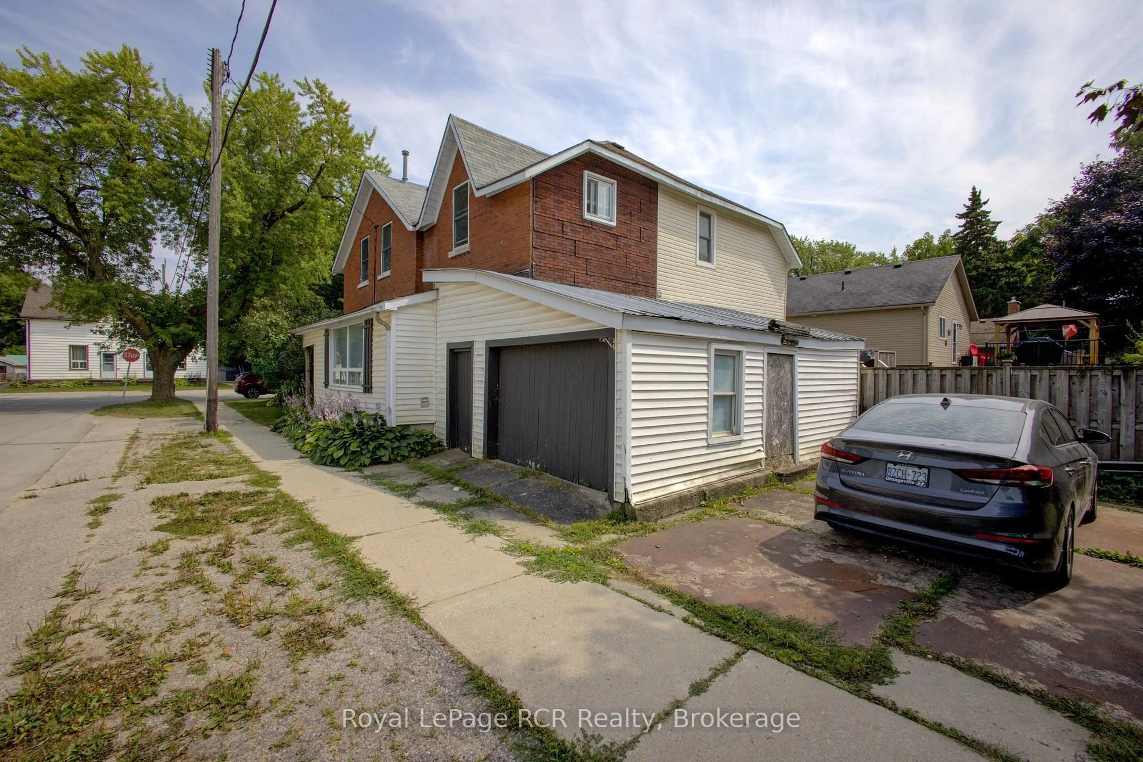 A pic from outside/outdoor area/front of a property/back of a property/a pic from drone, street for 231 Tucker St, Wellington North Ontario N0G 1A0