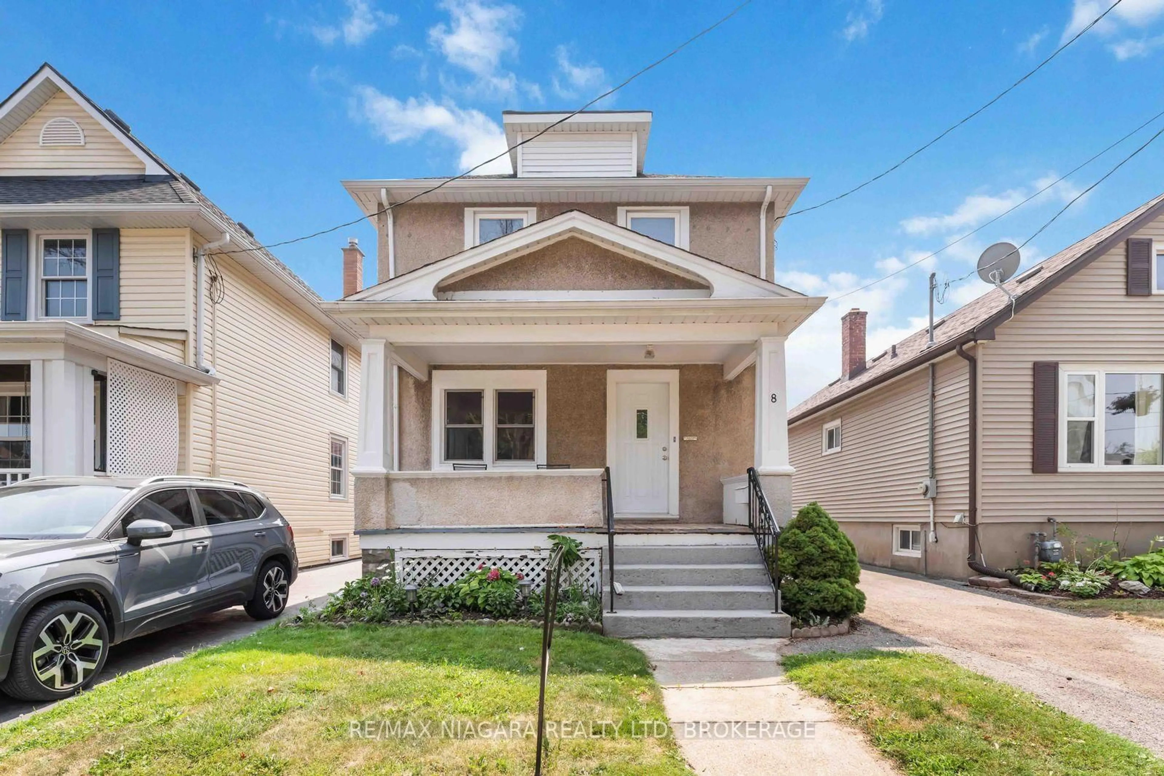 Home with vinyl exterior material, street for 8 Russell Ave, St. Catharines Ontario L2R 1T9