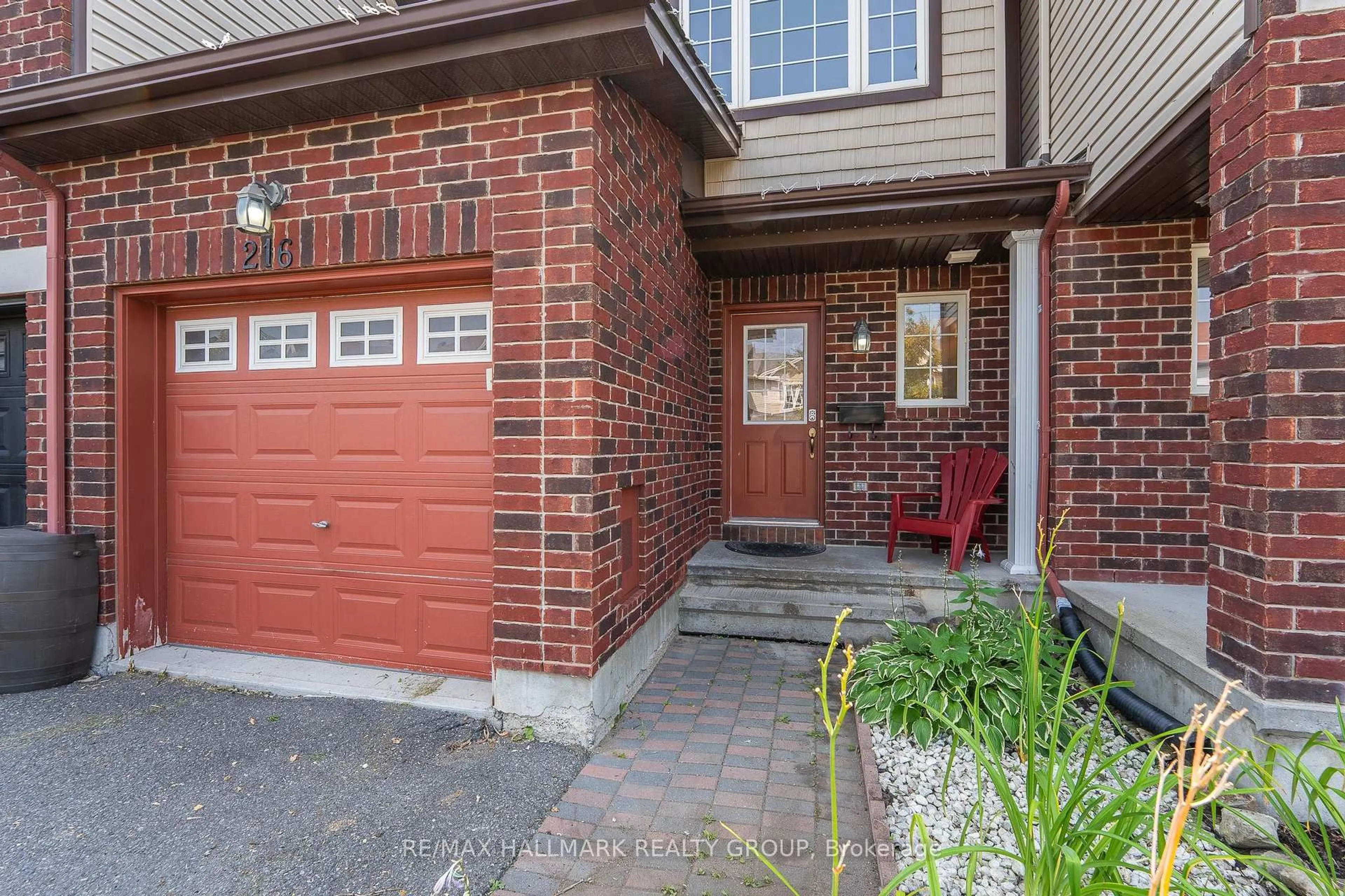 Home with brick exterior material, street for 216 Rolling Meadow Cres, Orleans Ontario K1W 0B1