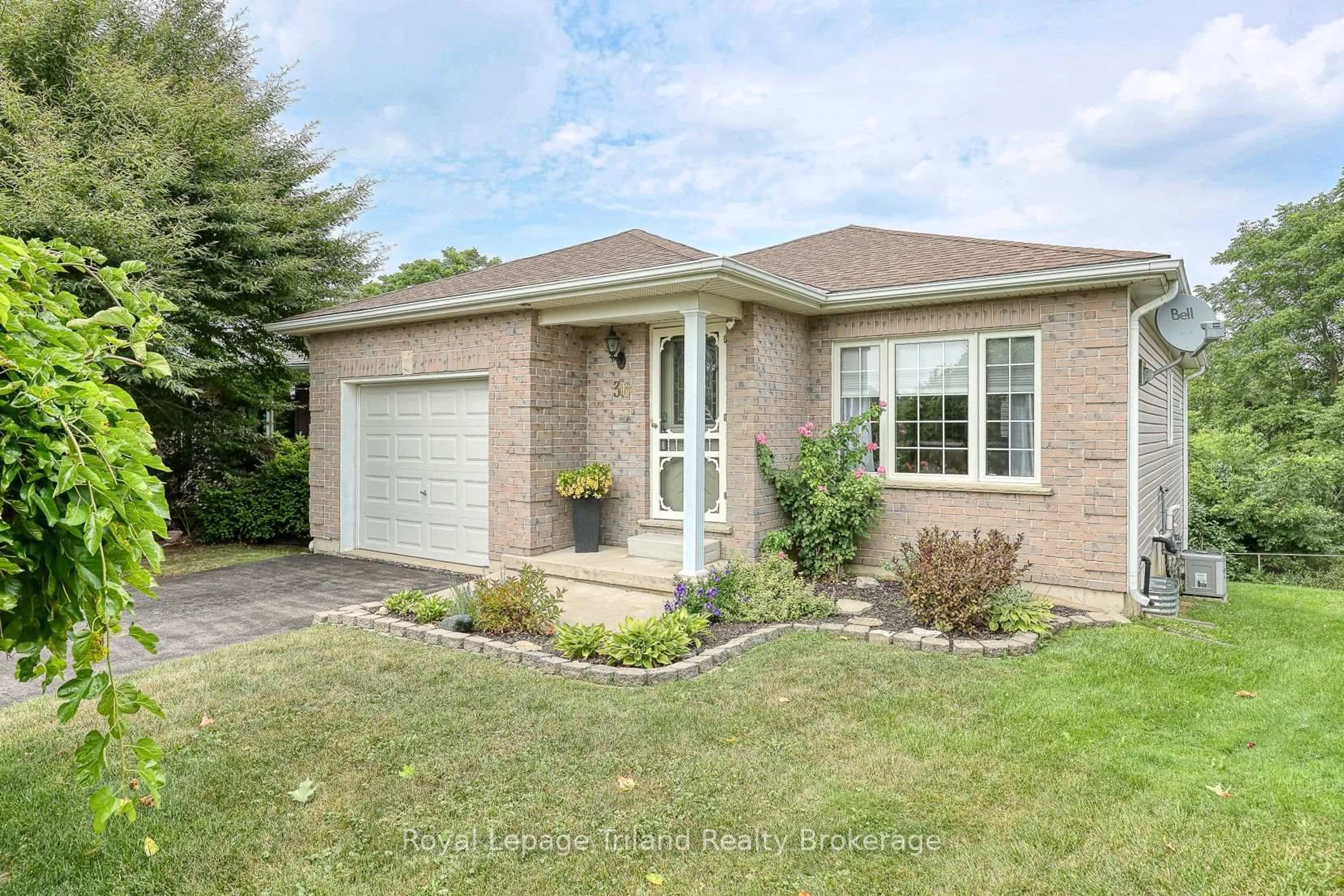 Home with brick exterior material, street for 36 Rossiter Rd, Ingersoll Ontario N5C 4E1