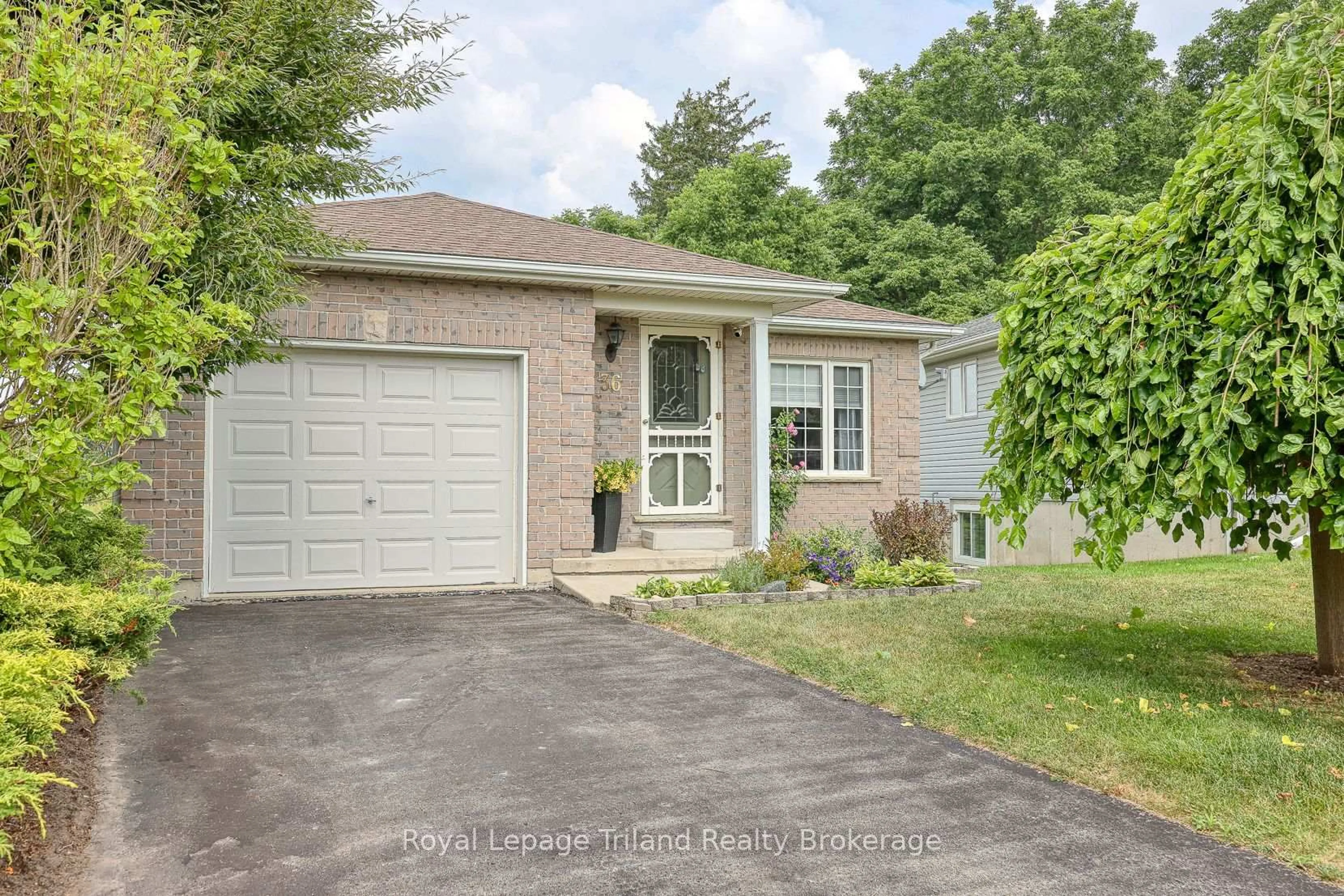 Home with brick exterior material, street for 36 Rossiter Rd, Ingersoll Ontario N5C 4E1