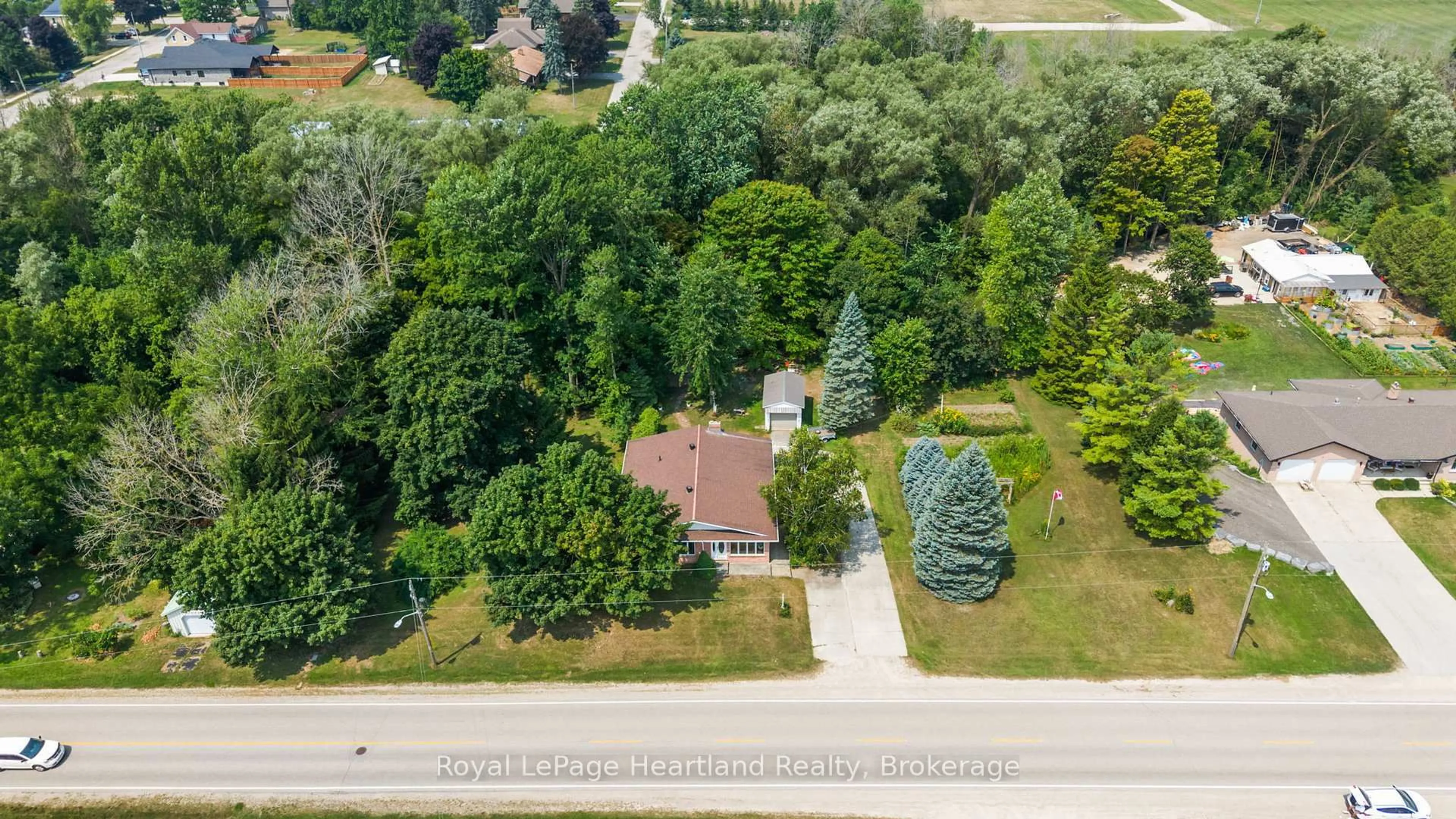 A pic from outside/outdoor area/front of a property/back of a property/a pic from drone, street for 23 Mill St, Minto Ontario N0G 1M0