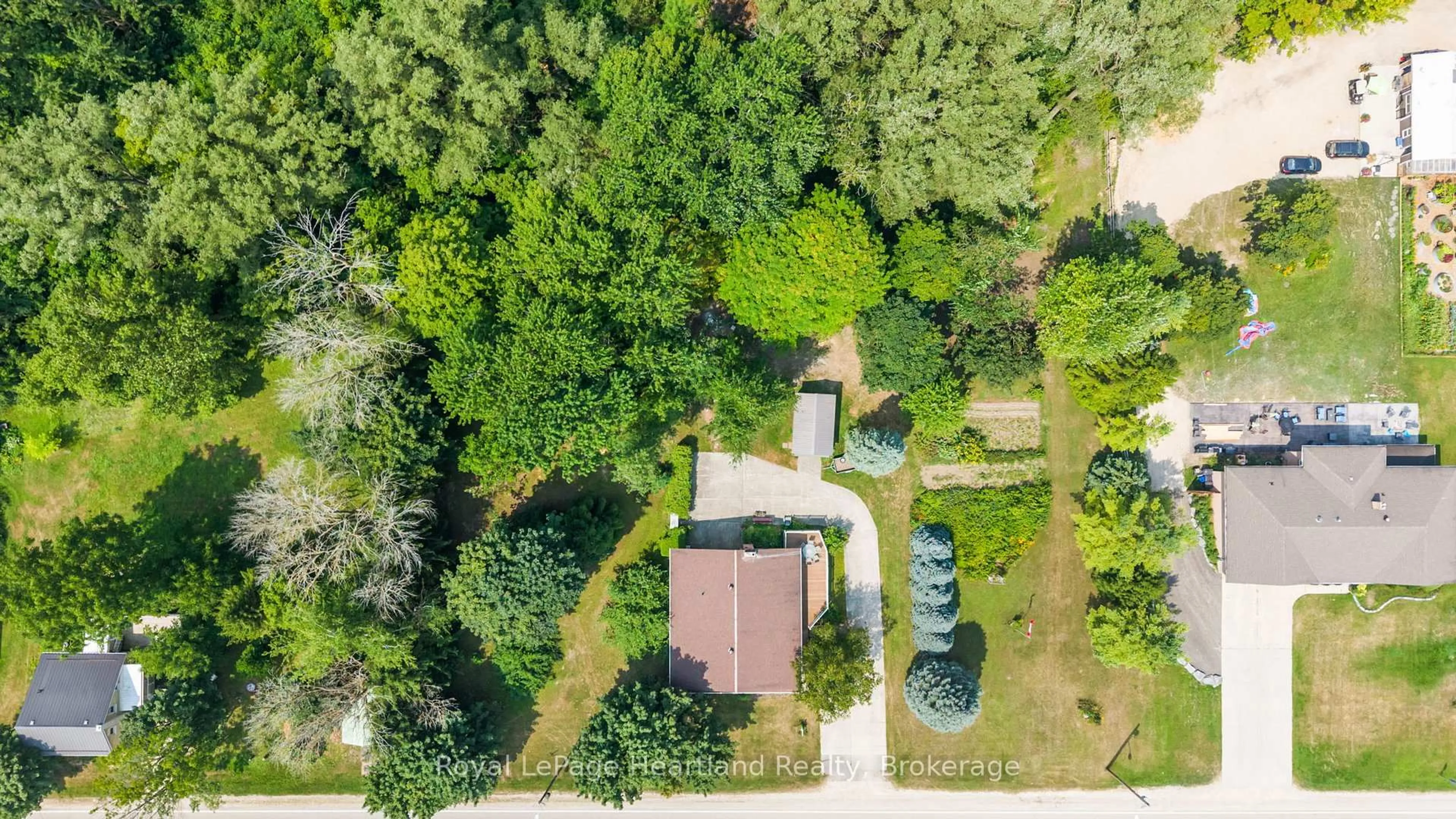 A pic from outside/outdoor area/front of a property/back of a property/a pic from drone, forest/trees view for 23 Mill St, Minto Ontario N0G 1M0